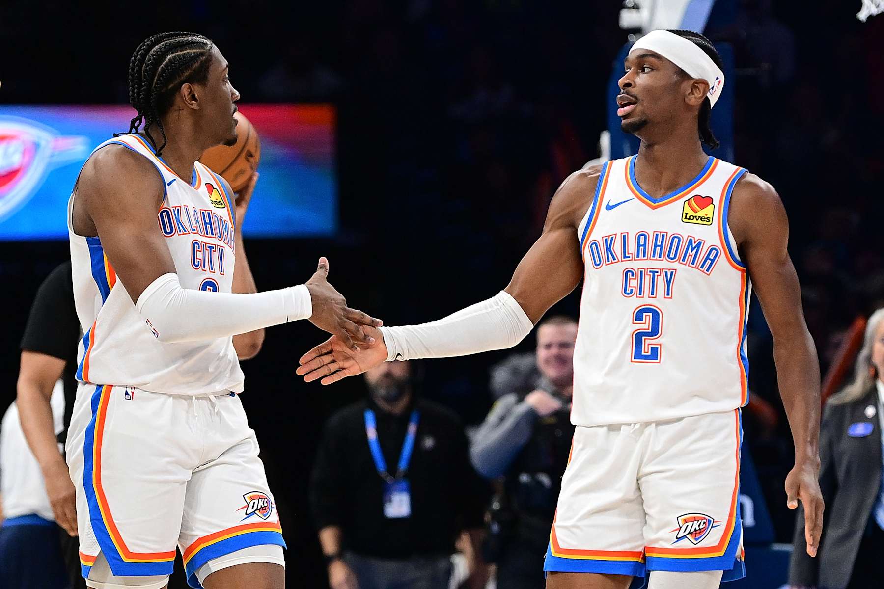 OKLAHOMA CITY, OKLAHOMA - JANUARY 13: Jalen Williams #8 and Shai Gilgeous-Alexander #2 of the Oklahoma City Thunder celebrate during the second half against the Orlando Magic at Paycom Center on January 13, 2024 in Oklahoma City, Oklahoma. NOTE TO USER: User expressly acknowledges and agrees that, by downloading and or using this Photograph, user is consenting to the terms and conditions of the Getty Images License Agreement. (Photo by Joshua Gateley/Getty Images)