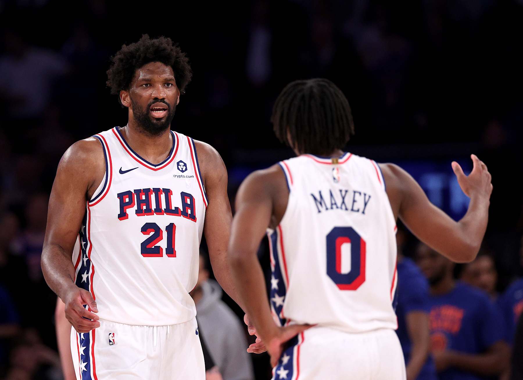 NEW YORK, NEW YORK - APRIL 30: Tyrese Maxey #0 and Joel Embiid #21 of the Philadelphia 76ers talk during the second half against the New York Knicks at Madison Square Garden on April 30, 2024 in New York City. The Philadelphia 76ers defeated the New York Knicks 112-106 in overtime. NOTE TO USER: User expressly acknowledges and agrees that, by downloading and or using this photograph, User is consenting to the terms and conditions of the Getty Images License Agreement. (Photo by Elsa/Getty Images)