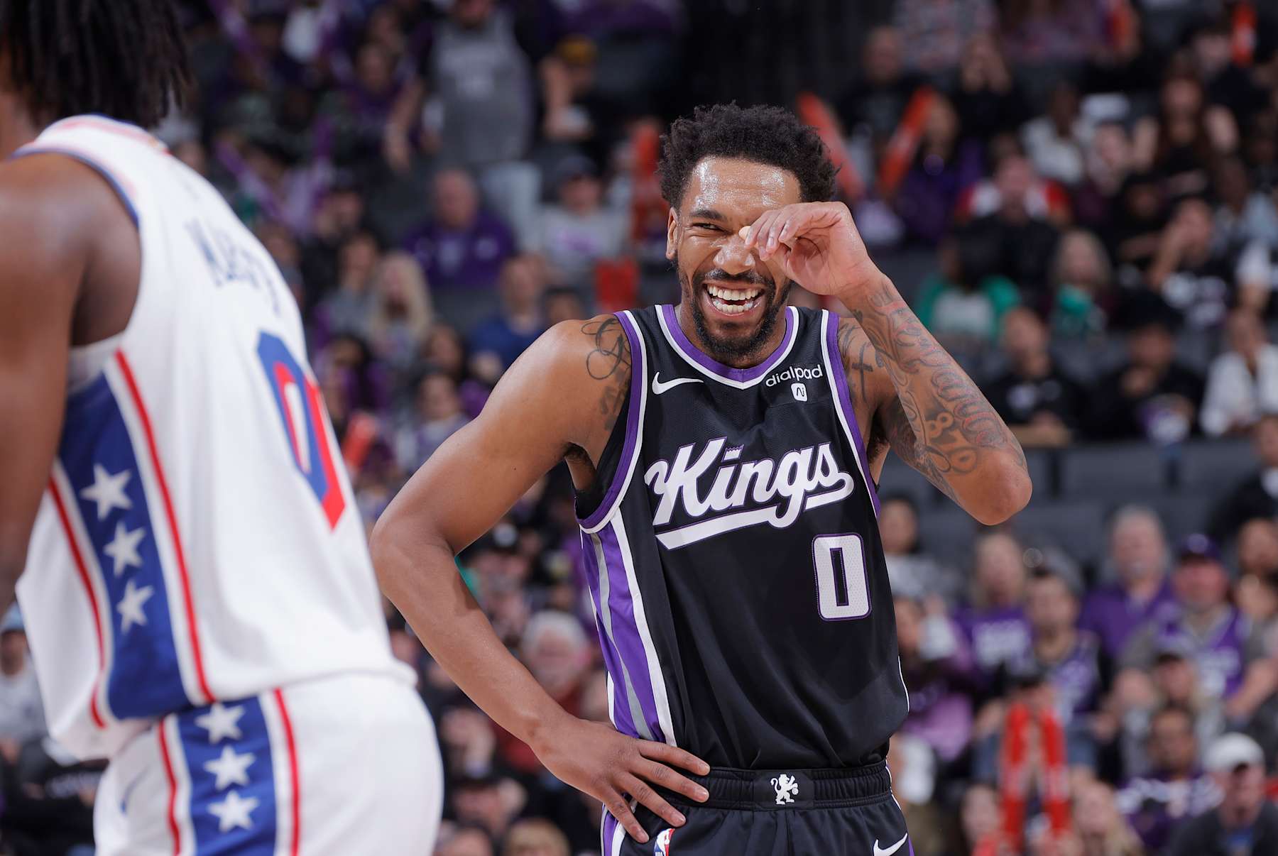 SACRAMENTO, CA - MARCH 25: Malik Monk #0 of the Sacramento Kings smiles during the game against the Philadelphia 76ers on March 25, 2024 at Golden 1 Center in Sacramento, California. NOTE TO USER: User expressly acknowledges and agrees that, by downloading and or using this photograph, User is consenting to the terms and conditions of the Getty Images Agreement. Mandatory Copyright Notice: Copyright 2024 NBAE (Photo by Rocky Widner/NBAE via Getty Images)