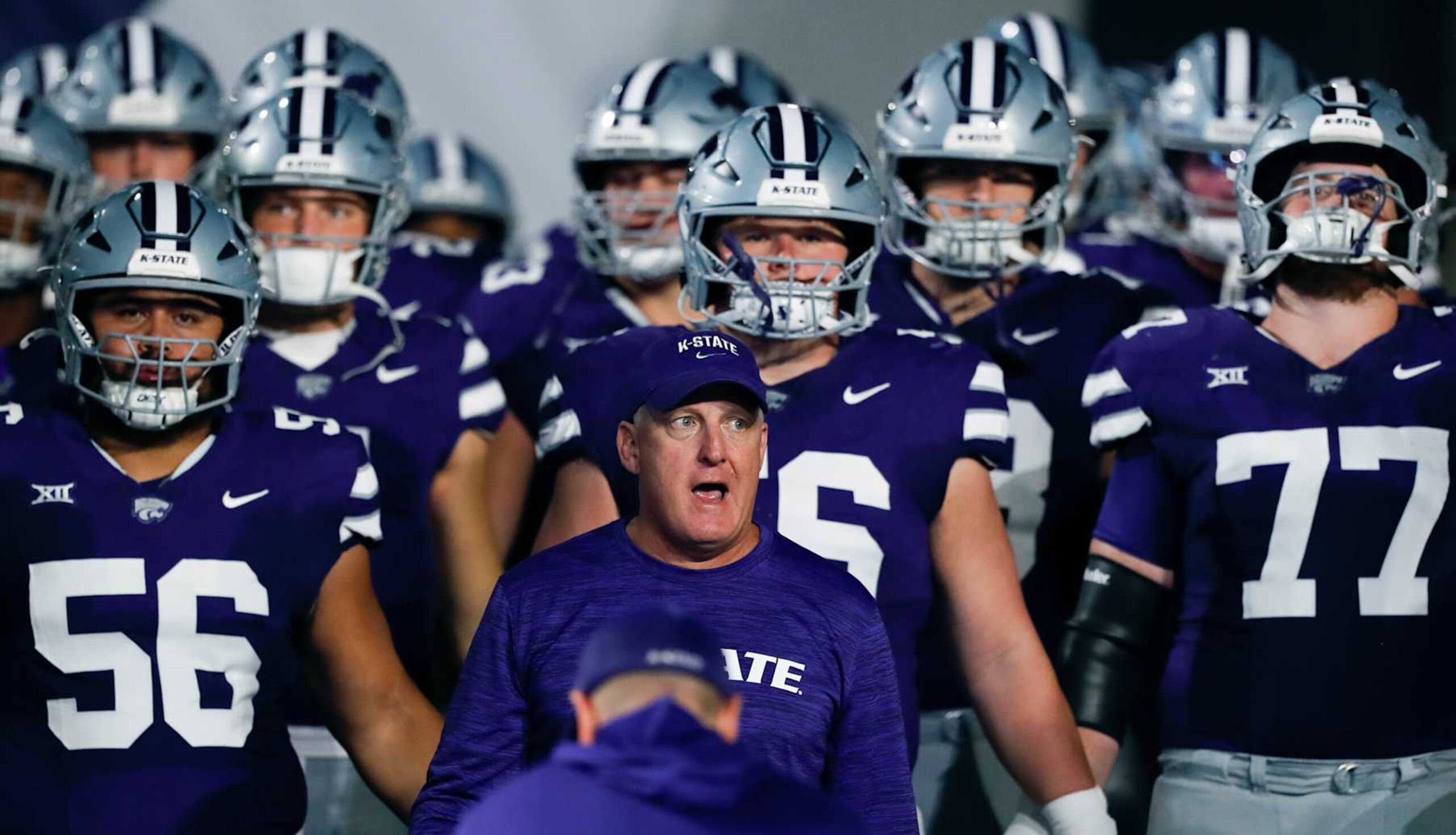 PROVO, UT - SEPTEMBER 21: Head coach Chris Klieman of the Kansas State Wildcats brings his team on to the field before their game against the Brigham Young Cougars at LaVell Edwards Stadium on September 21, 2024 in Provo, Utah.(Photo by Chris Gardner/Getty Images)