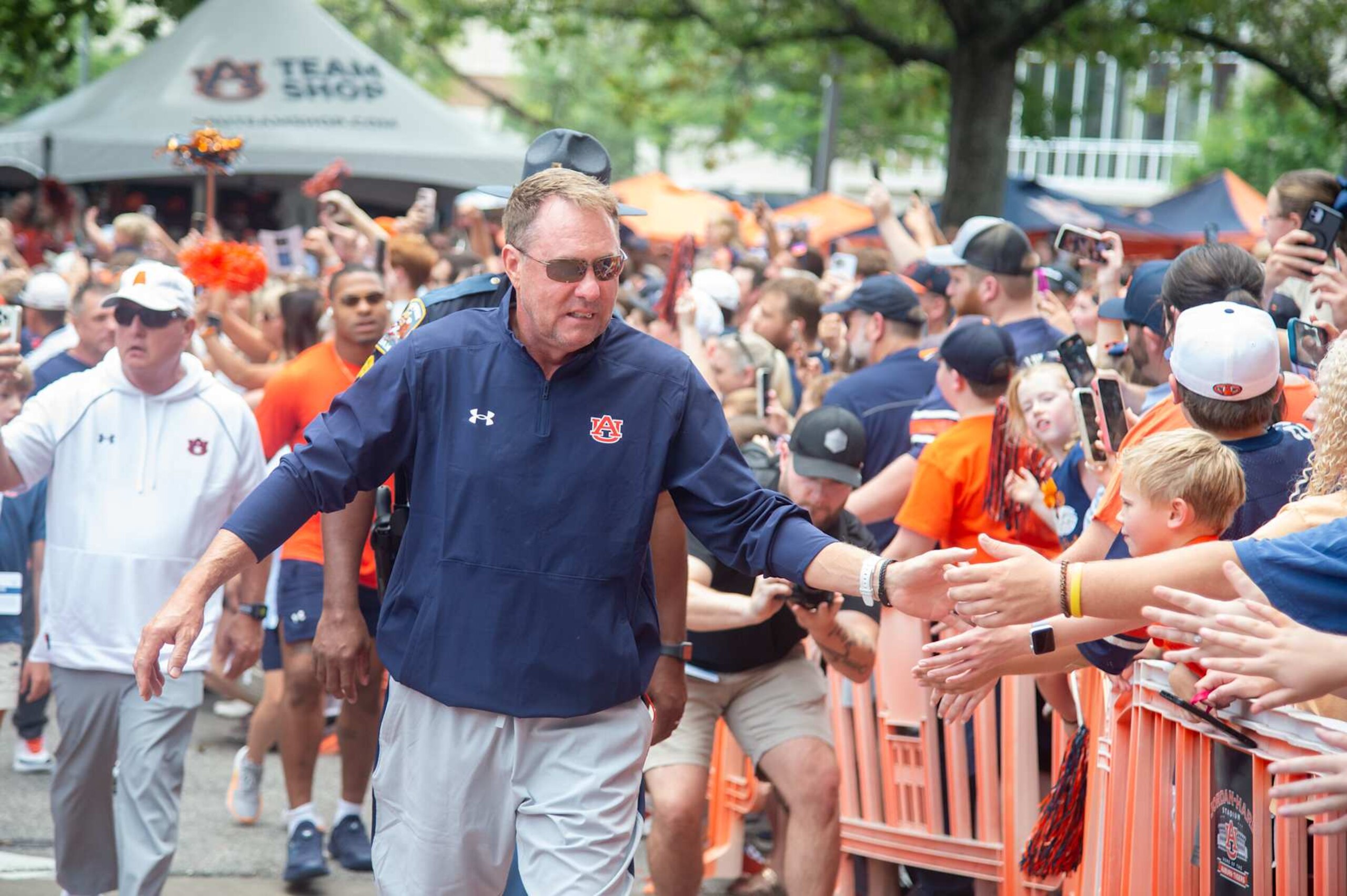 AUBURN, ALABAMA - SEPTEMBER 21: Head coach Hugh Freeze of the Auburn Tigers greets fans during their Tiger Walk prior to their game against the Arkansas Razorbacks at Jordan-Hare Stadium on September 21, 2024 in Auburn, Alabama. (Photo by Michael Chang/Getty Images)
