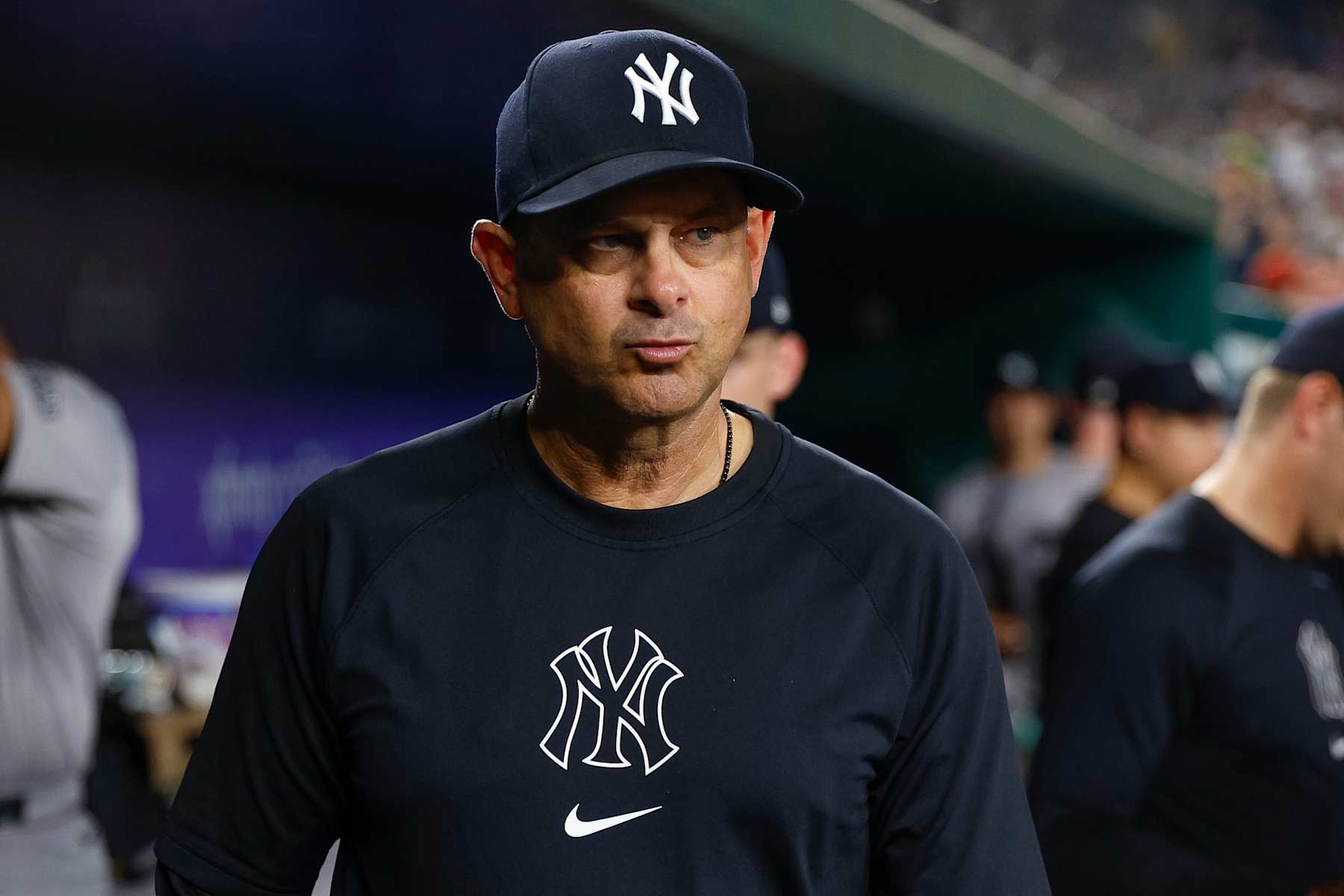 WASHINGTON, DC - AUGUST 28: Manager Aaron Boone #17 of the New York Yankees walks through the dugout in the fifth inning during a game against the Washington Nationals at Nationals Park on August 28, 2024 in Washington, DC. (Photo by Brandon Sloter/Image Of Sport/Getty Images)