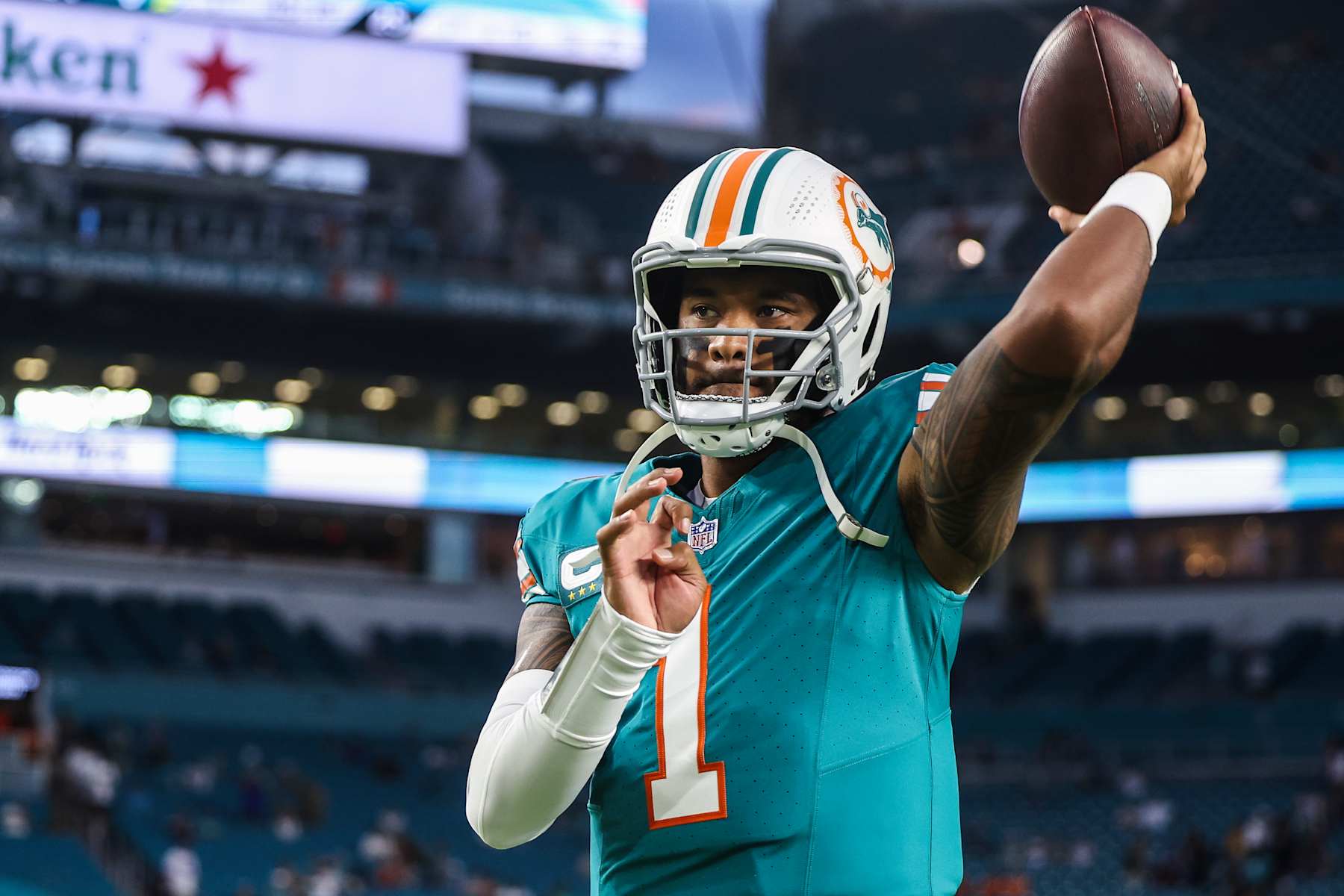 MIAMI GARDENS, FL - SEPTEMBER 12: Tua Tagovailoa #1 of the Miami Dolphins warms up prior to an NFL football game against the Buffalo Bills at Hard Rock Stadium on September 12, 2024 in Miami Gardens, FL. (Photo by Perry Knotts/Getty Images)