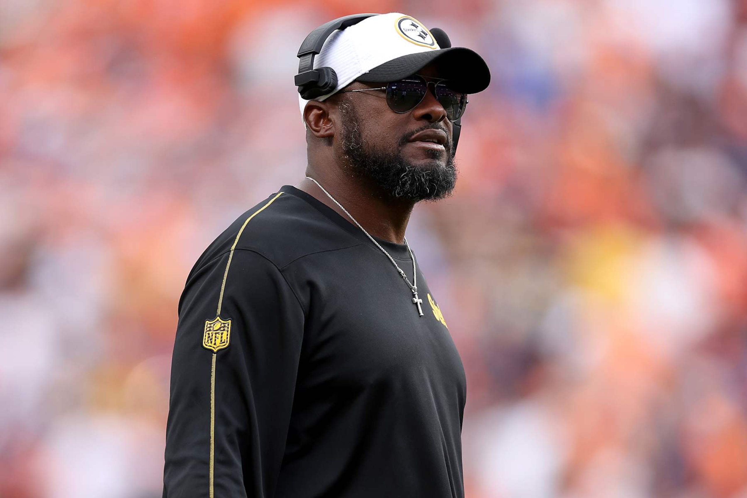 DENVER, COLORADO - SEPTEMBER 15: Head coach Mike Tomlin of the Pittsburgh Steelers watches as his team plays the Denver Broncos in the second quarter at Empower Field At Mile High on September 15, 2024 in Denver, Colorado. (Photo by Matthew Stockman/Getty Images)