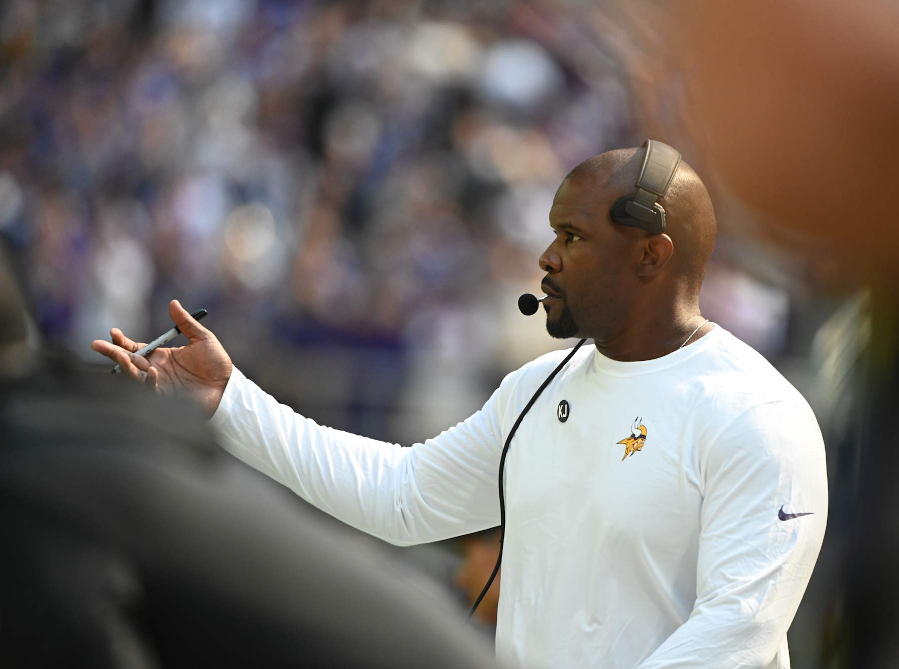 MINNEAPOLIS, MN - SEPTEMBER 22: Minnesota Vikings assistant coach Brian Flores watches action during the NFL game between the Houston Texans and the Minnesota Vikings on September 22, 2024, at U.S. Bank Stadium in Minneapolis, MN. (Photo by John Rivera/Icon Sportswire via Getty Images)