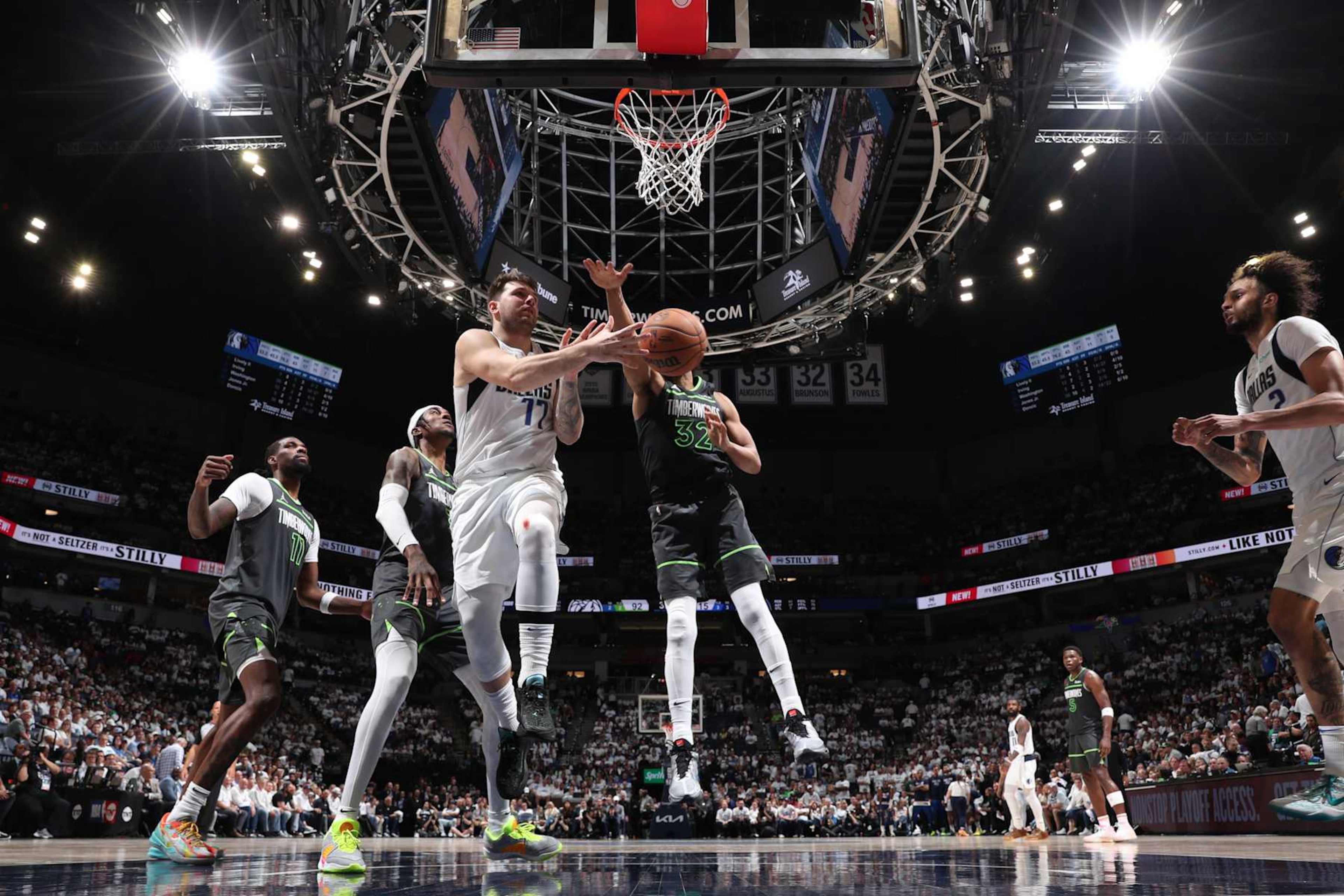 MINNEAPOLIS, MN - MAY 30: Luka Doncic #77 of the Dallas Mavericks passes the ball during the game against the Minnesota Timberwolves during Round 3 Game 5 of the 2024 NBA Playoffs on May 30, 2024 at Target Center in Minneapolis, Minnesota. NOTE TO USER: User expressly acknowledges and agrees that, by downloading and or using this Photograph, user is consenting to the terms and conditions of the Getty Images License Agreement. Mandatory Copyright Notice: Copyright 2024 NBAE (Photo by Joe Murphy/NBAE via Getty Images) MINNEAPOLIS, MN - MAY 30: Luka Doncic #77 of the Dallas Mavericks passes the ball during the game against the Minnesota Timberwolves during Round 3 Game 5 of the 2024 NBA Playoffs on May 30, 2024 at Target Center in Minneapolis, Minnesota. NOTE TO USER: User expressly acknowledges and agrees that, by downloading and or using this Photograph, user is consenting to the terms and conditions of the Getty Images License Agreement. Mandatory Copyright Notice: Copyright 2024 NBAE (Photo by Joe Murphy/NBAE via Getty Images)