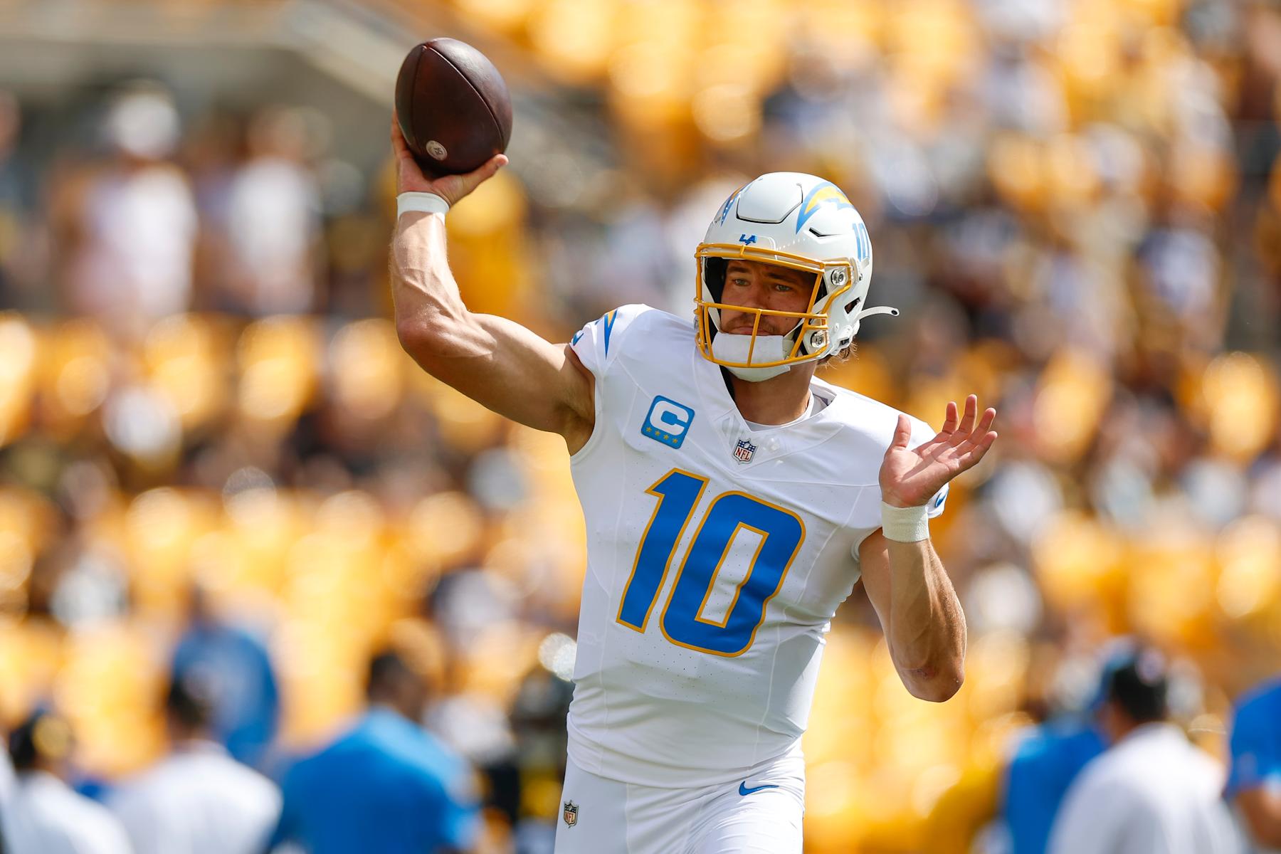 PITTSBURGH, PENNSYLVANIA - SEPTEMBER 22: Justin Herbert #10 of the Los Angeles Chargers warms up prior to a game against the Pittsburgh Steelers at Acrisure Stadium on September 22, 2024 in Pittsburgh, Pennsylvania. (Photo by Brandon Sloter/Getty Images)