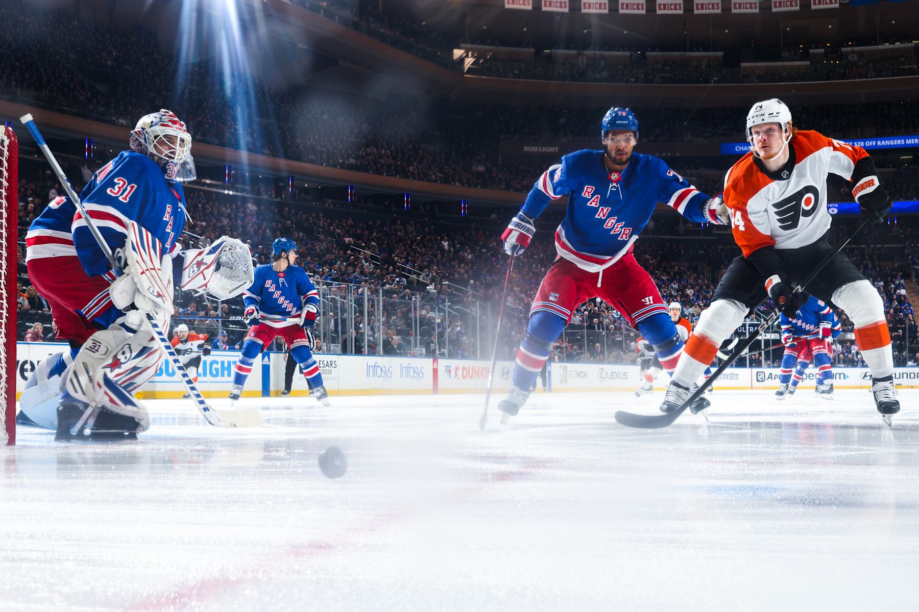 NEW YORK, NEW YORK - MARCH 26: Igor Shesterkin #31 of the New York Rangers tends the net as K'Andre Miller #79 defends against Owen Tippett #74 of the Philadelphia Flyers at Madison Square Garden on March 26, 2024 in New York City. (Photo by Jared Silber/NHLI via Getty Images)