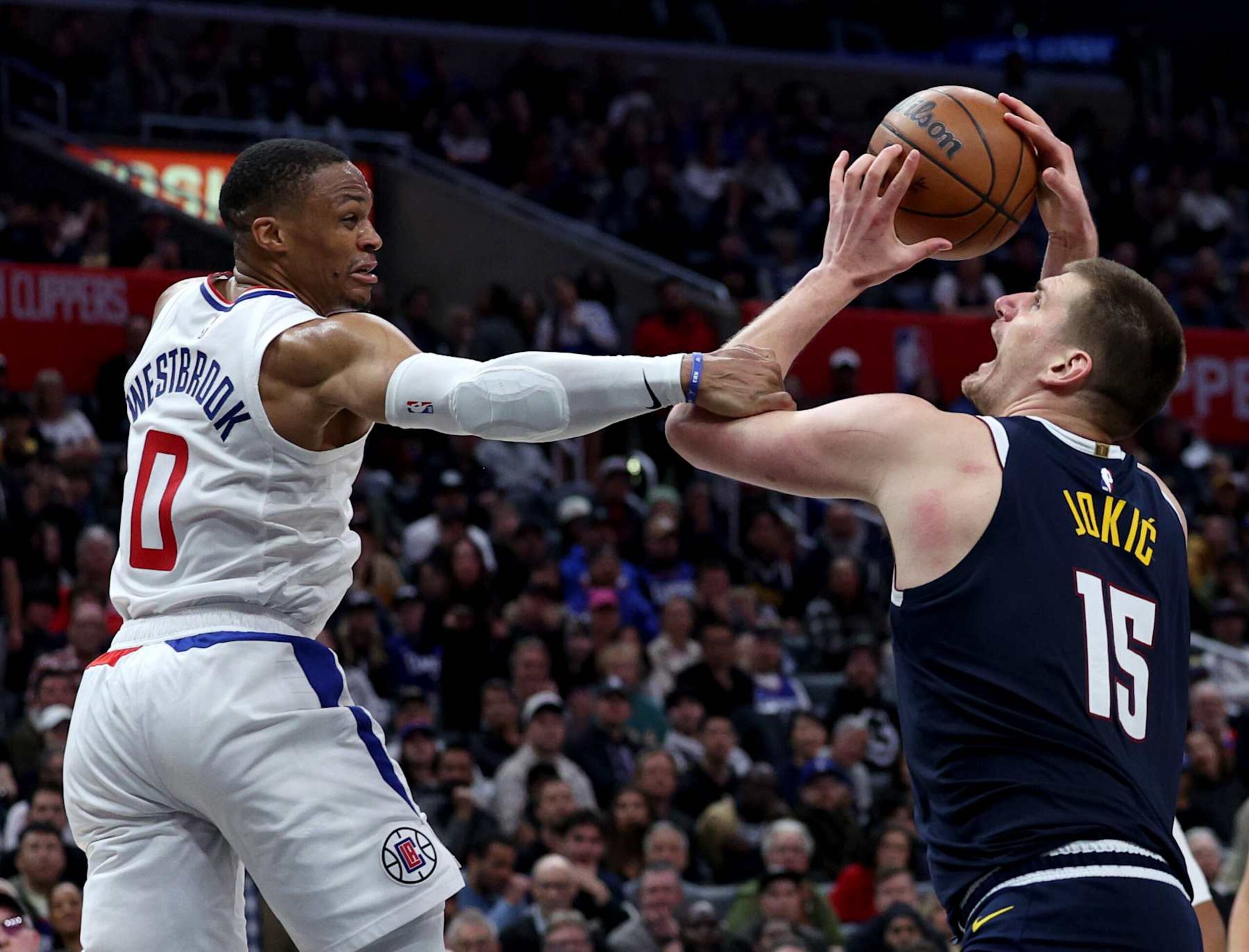 LOS ANGELES, CALIFORNIA - APRIL 04: Nikola Jokic #15 of the Denver Nuggets reacts as he is fouled by Russell Westbrook #0 of the LA Clippers during a 102-100 Clippers win at Crypto.com Arena on April 04, 2024 in Los Angeles, California. User is consenting to the terms and conditions of the Getty Images License Agreement. (Photo by Harry How/Getty Images) LOS ANGELES, CALIFORNIA - APRIL 04: Nikola Jokic #15 of the Denver Nuggets reacts as he is fouled by Russell Westbrook #0 of the LA Clippers during a 102-100 Clippers win at Crypto.com Arena on April 04, 2024 in Los Angeles, California. User is consenting to the terms and conditions of the Getty Images License Agreement. (Photo by Harry How/Getty Images)