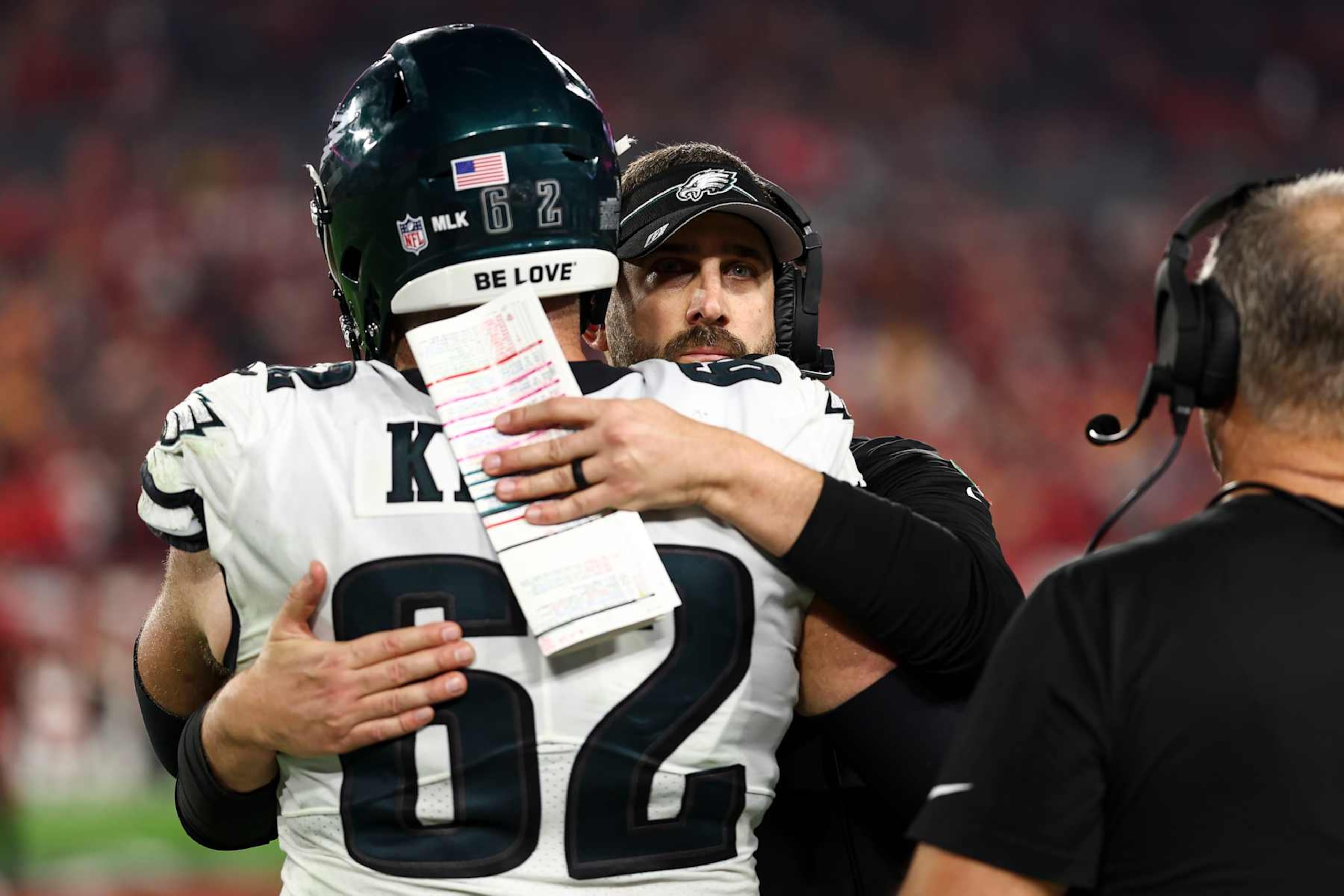 TAMPA, FL - JANUARY 15: Jason Kelce #62 of the Philadelphia Eagles hugs head coach Nick Sirianni during the fourth quarter of an NFL wild-card playoff football game against the Tampa Bay Buccaneers at Raymond James Stadium on January 15, 2024 in Tampa, Florida. (Photo by Kevin Sabitus/Getty Images)