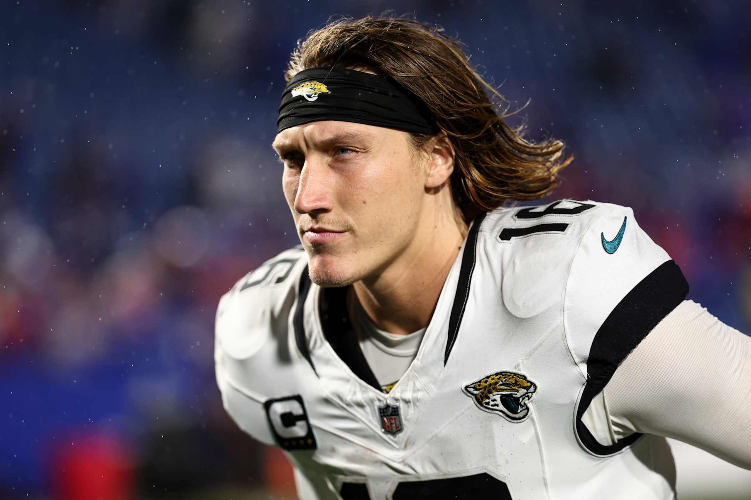ORCHARD PARK, NY - SEPTEMBER 23: Trevor Lawrence #16 of the Jacksonville Jaguars jogs off the field after an NFL football game against the Buffalo Bills at Highmark Stadium on September 23, 2024 in Orchard Park, New York. (Photo by Kevin Sabitus/Getty Images) ORCHARD PARK, NY - SEPTEMBER 23: Trevor Lawrence #16 of the Jacksonville Jaguars jogs off the field after an NFL football game against the Buffalo Bills at Highmark Stadium on September 23, 2024 in Orchard Park, New York. (Photo by Kevin Sabitus/Getty Images)