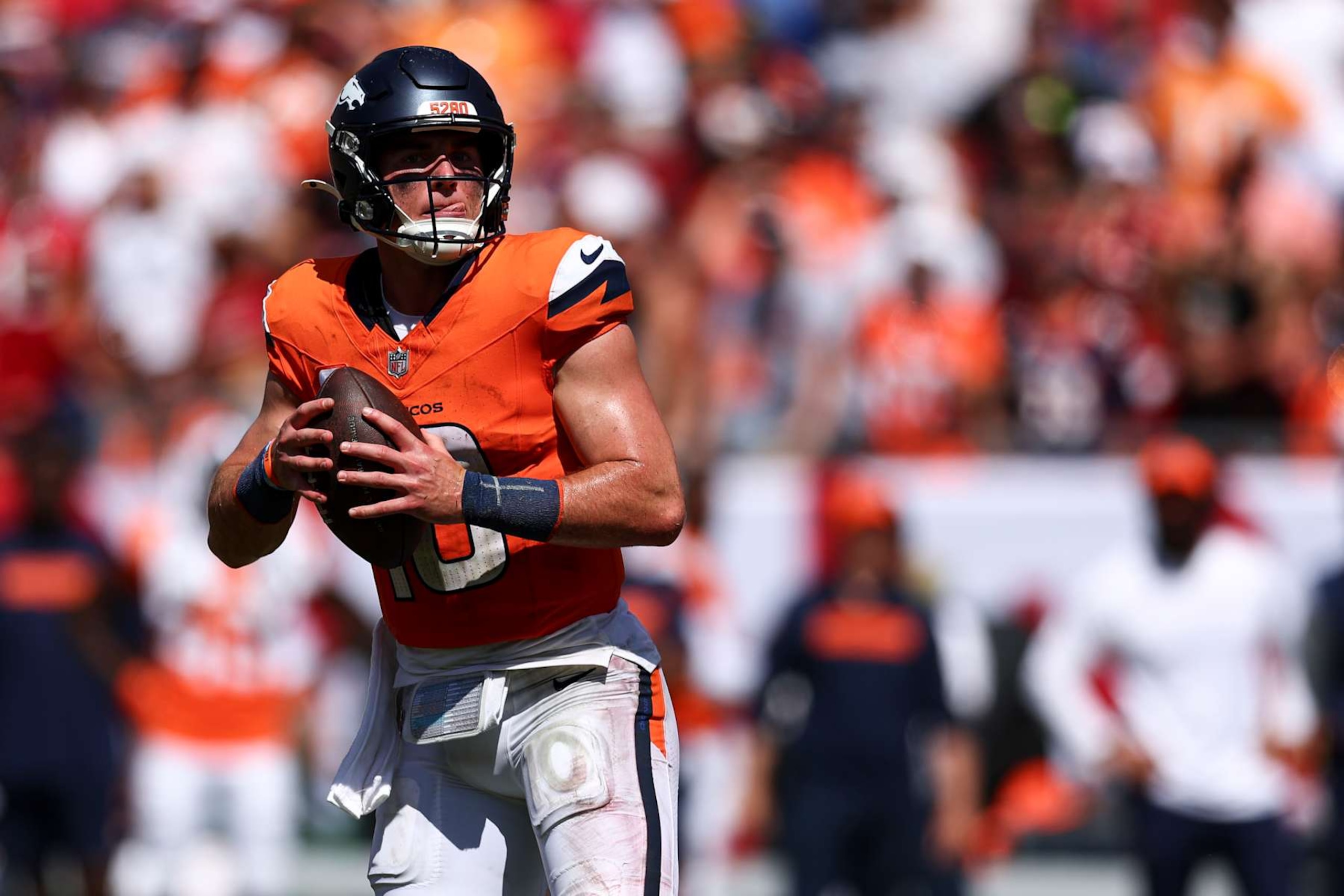 TAMPA, FL - SEPTEMBER 22: Bo Nix #10 of the Denver Broncos drops back to pass during an NFL football game against the Tampa Bay Buccaneers at Raymond James Stadium on September 22, 2024 in Tampa, Florida. (Photo by Kevin Sabitus/Getty Images) TAMPA, FL - SEPTEMBER 22: Bo Nix #10 of the Denver Broncos drops back to pass during an NFL football game against the Tampa Bay Buccaneers at Raymond James Stadium on September 22, 2024 in Tampa, Florida. (Photo by Kevin Sabitus/Getty Images)