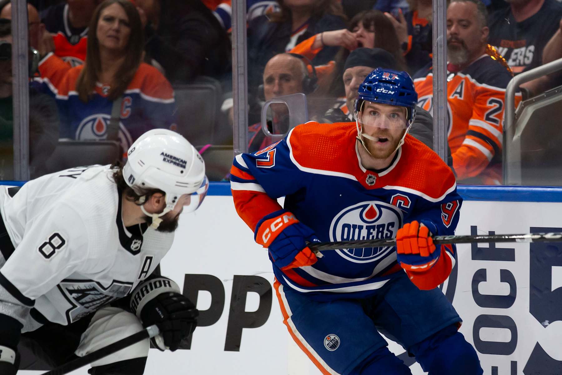 EDMONTON, CANADA - MAY 1: Connor McDavid #97 of the Edmonton Oilers skates against Drew Doughty #8 of the Los Angeles Kings during the second period in Game Five of the First Round of the 2024 Stanley Cup Playoffs at Rogers Place on May 1, 2024, in Edmonton, Canada. (Photo by Codie McLachlan/Getty Images)