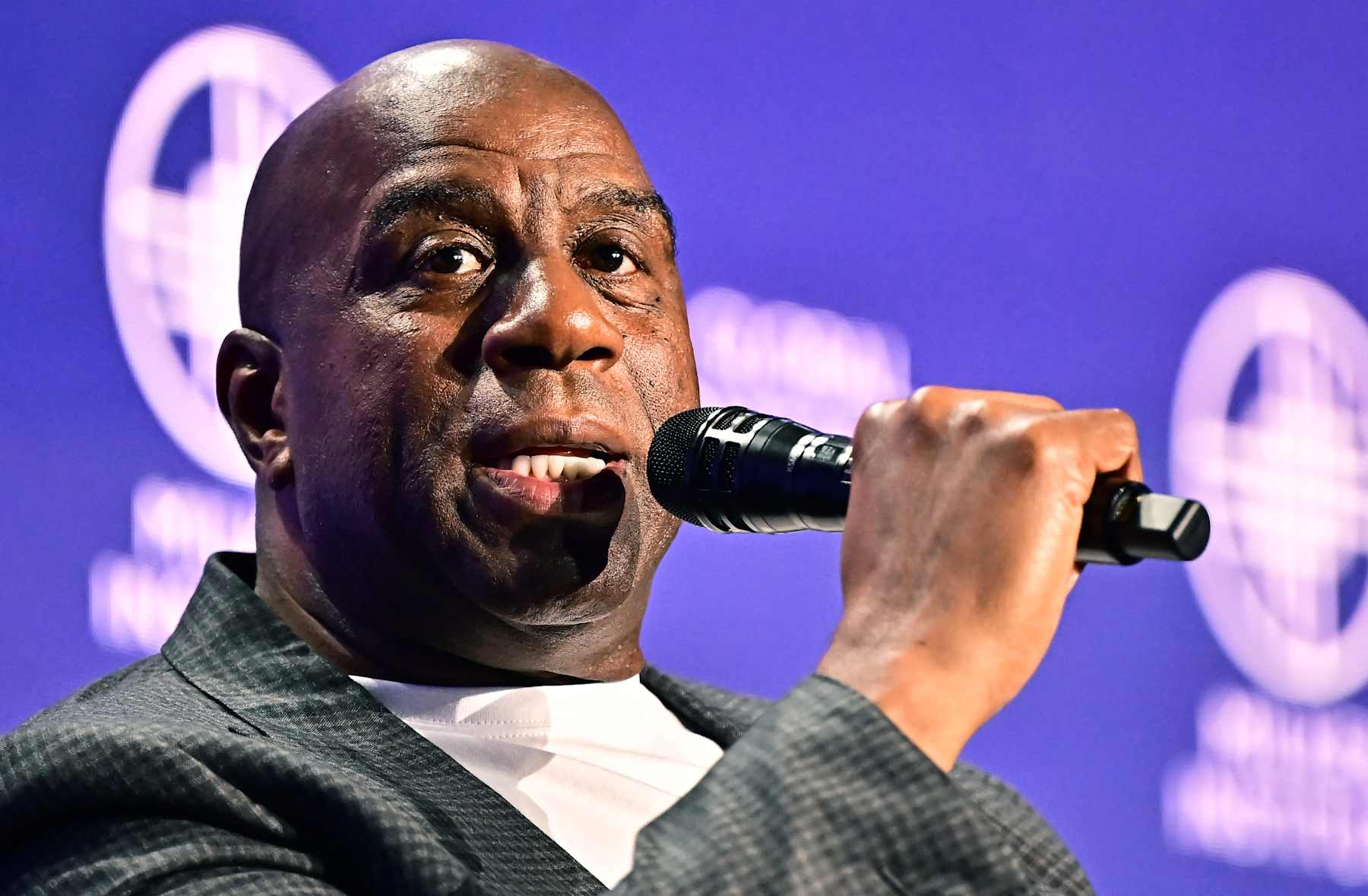 Earvin 'Magic' Johnson, Chairman and CEO Magic Johnson Enterprises and former Los Angeles Laker, speaks at the 27th annual Milken Institute Global Conference at the Beverly Hilton in Los Angeles on May 7, 2024. (Photo by Frederic J. BROWN / AFP) (Photo by FREDERIC J. BROWN/AFP via Getty Images)