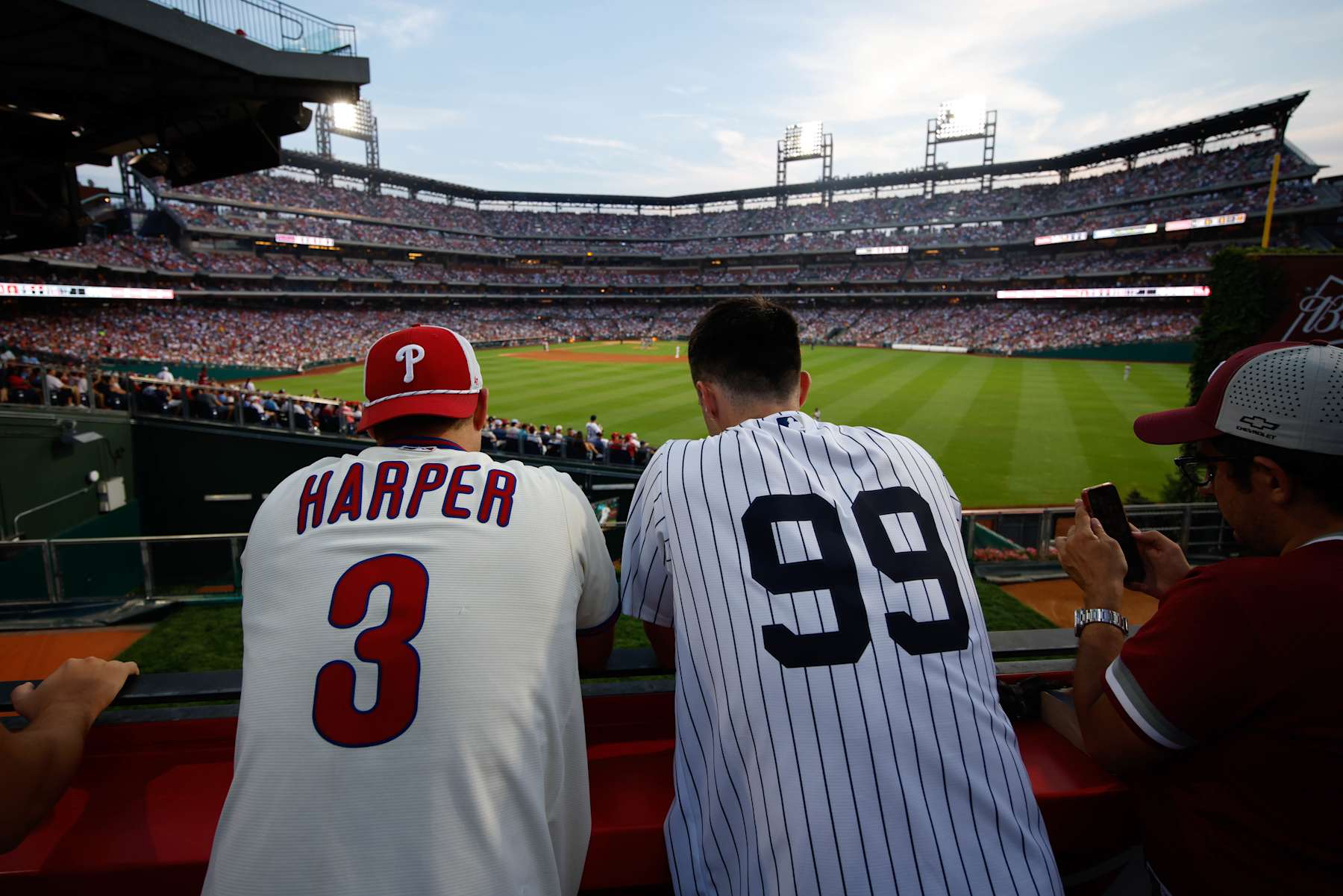 PHILADELPHIA, PA - JULY 30:  Fans wearing the jerseys of Bryce Harper #3 of the Philadelphia Phillies and Aaron Judge #99 of the New York Yankees look on during the game between the New York Yankees and the Philadelphia Phillies at Citizens Bank Park on Tuesday, July 30, 2024 in Philadelphia, Pennsylvania. (Photo by Rob Tringali/MLB Photos via Getty Images)
