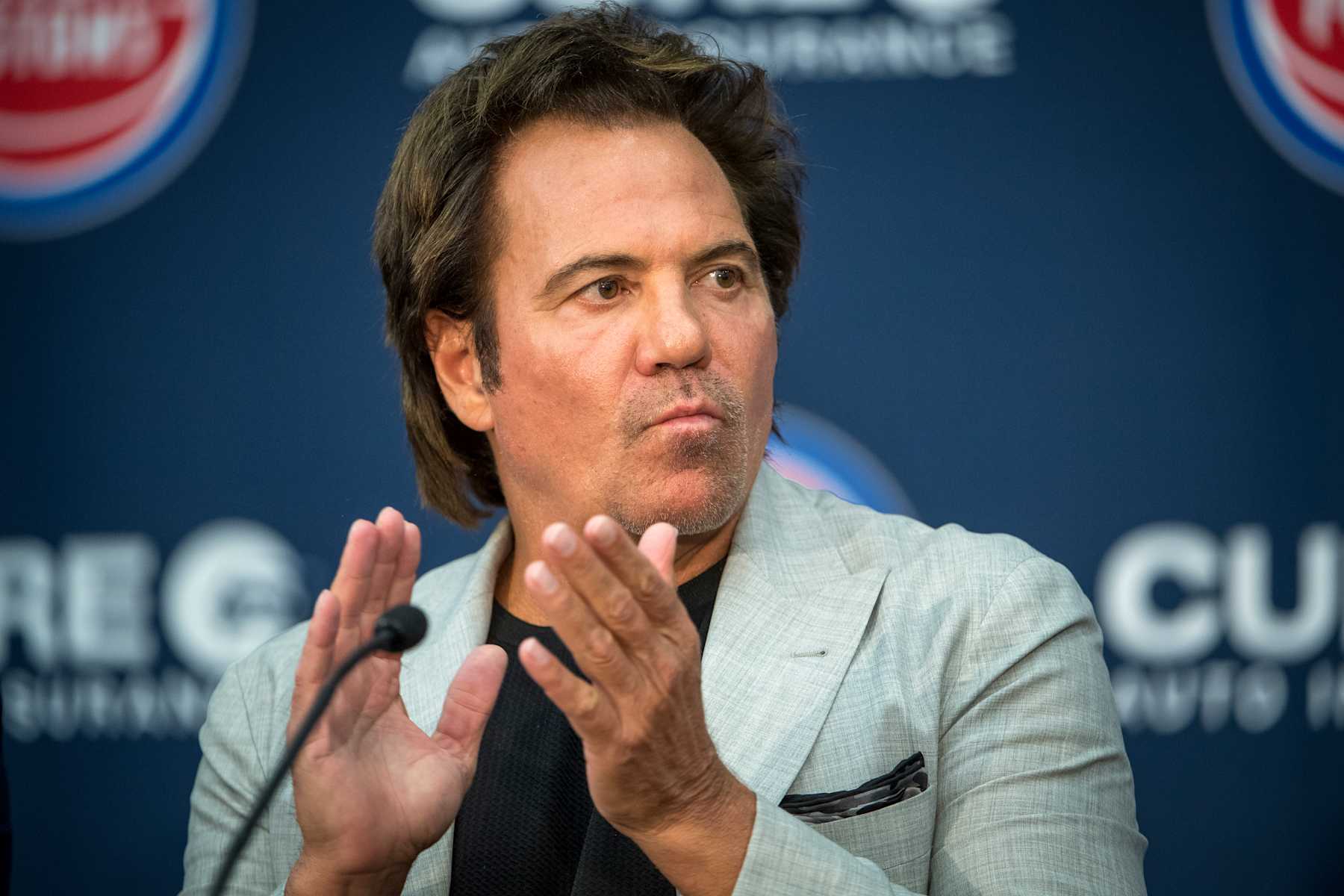 DETROIT, MICHIGAN - JULY 30: Detroit Pistons team owner Tom Gores claps during the press conference on July 30, 2021 at the Pistons Performance Center in Detroit, Michigan. (Photo by Nic Antaya/Getty Images)