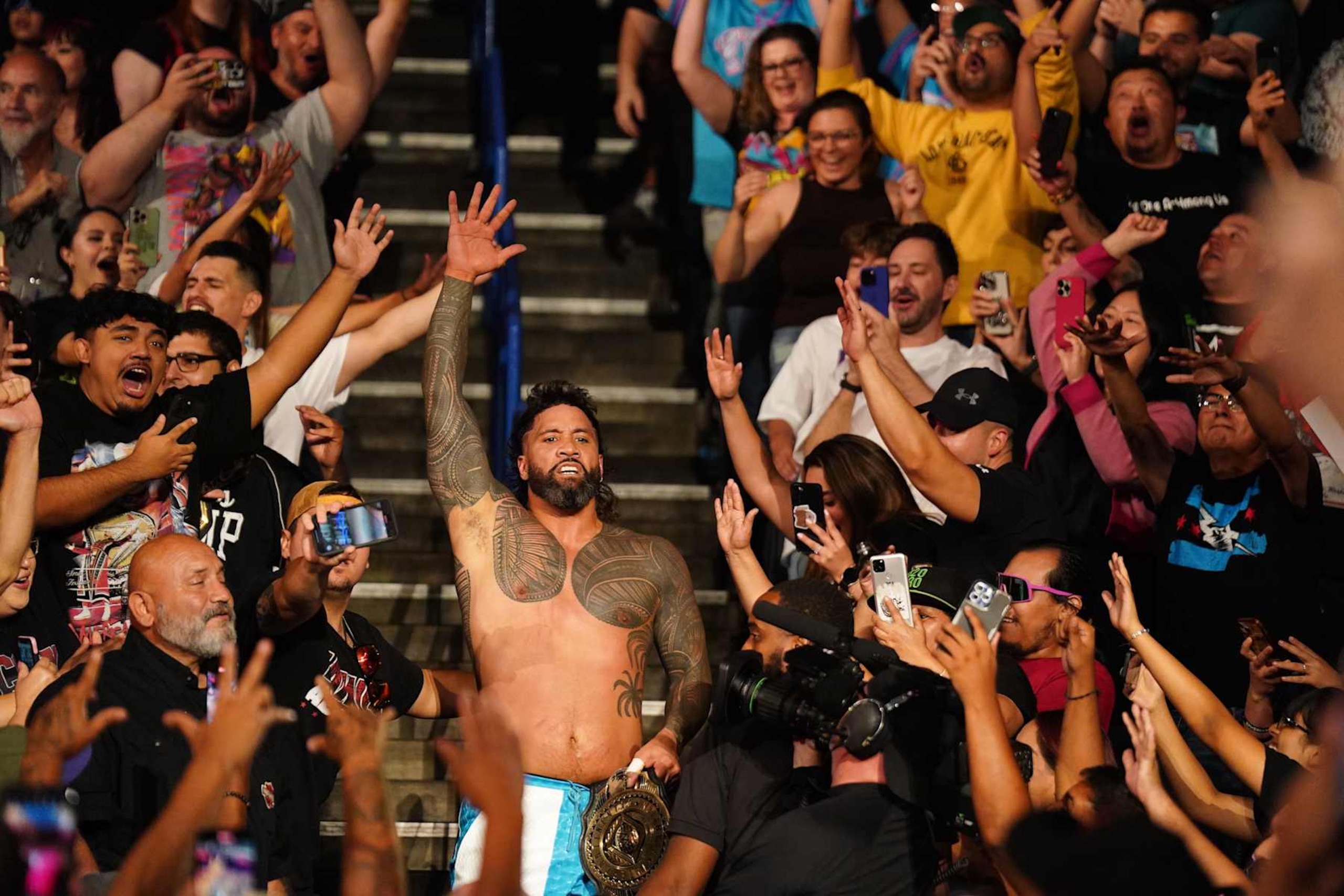 ONTARIO, CALIFORNIA - SEPTEMBER 23: Jey Uso celebrates in the crowd after winning the Intercontinental Championship during Monday Night RAW at Toyota Arena on September 23, 2024 in Ontario, California.  (Photo by WWE/Getty Images)