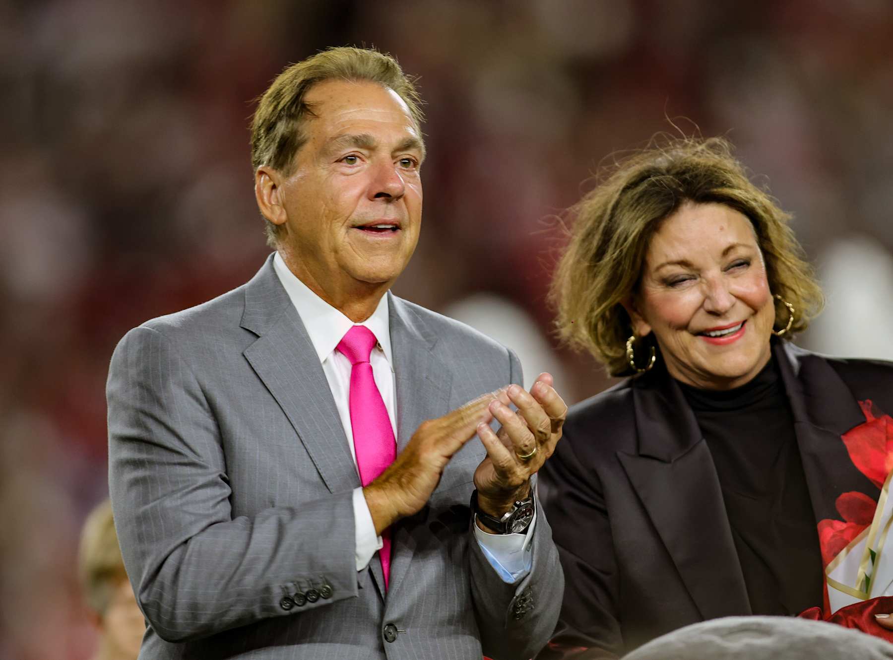 TUSCALOOSA, ALABAMA - SEPTEMBER 7: former University of Alabama head football coach Nick Saban and wife Terry are honored with ceremony dedicating the field in his name during the halftime break between the Alabama Crimson Tide and South Florida Bulls at Bryant-Denny Stadium on September 7, 2024 in Tuscaloosa, Alabama. (Photo by Brandon Sumrall/Getty Images)