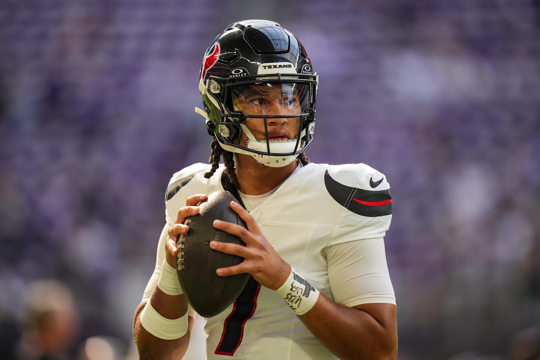 MINNEAPOLIS, MINNESOTA - SEPTEMBER 22: C.J. Stroud #7 of the Houston Texans warms up prior to game between the Minnesota Vikings and Houston Texans at U.S. Bank Stadium on September 22, 2024 in Minneapolis, Minnesota. (Photo by Brace Hemmelgarn/Getty Images)