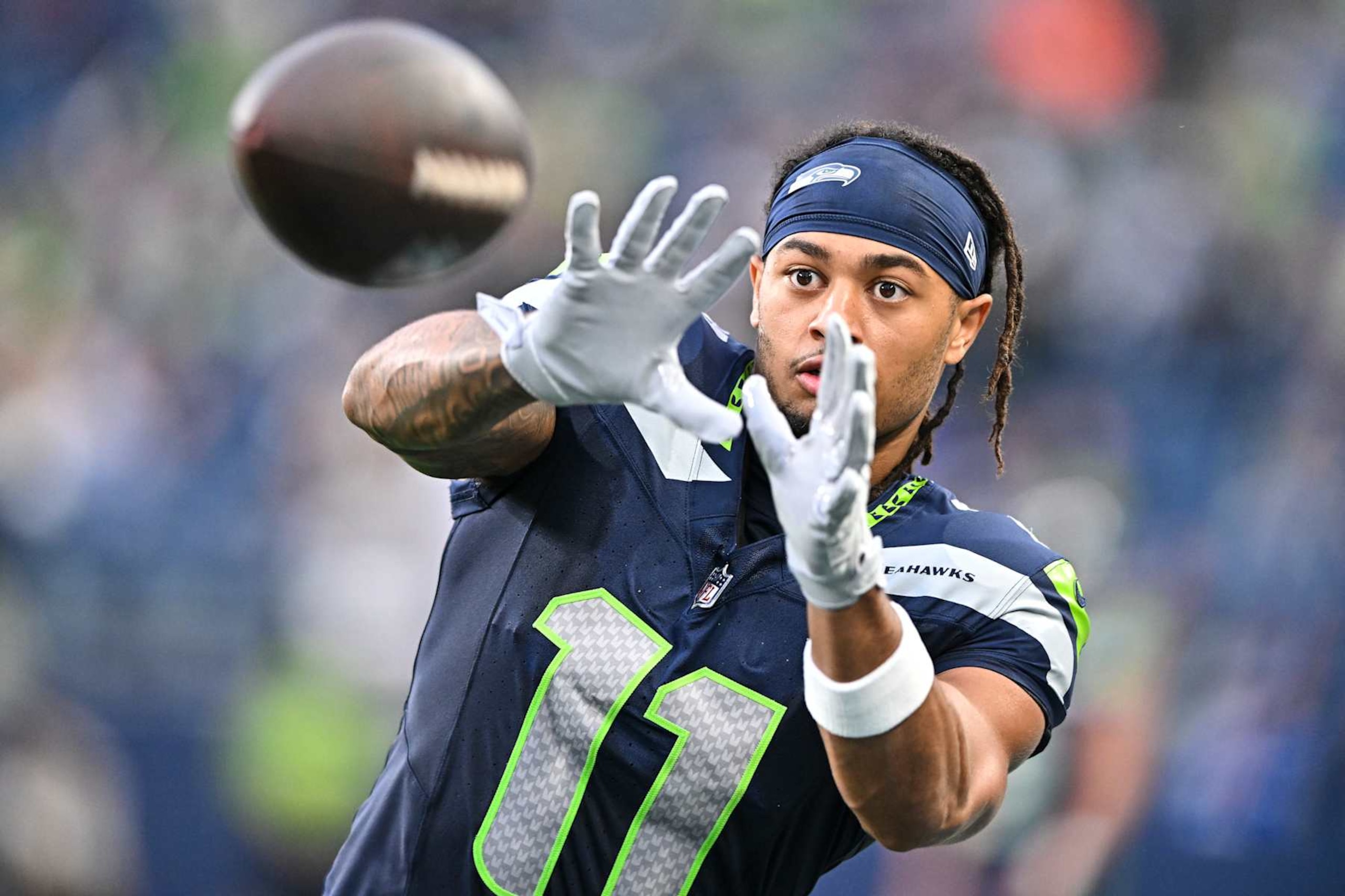 SEATTLE, WASHINGTON - AUGUST 24: Jaxon Smith-Njigba #11 of the Seattle Seahawks warms up prior to an NFL preseason football game against the Cleveland Browns at Lumen Field on August 24, 2024 in Seattle, Washington. The Seahawks defeated the Browns 37-33. (Photo by Alika Jenner/Getty Images)