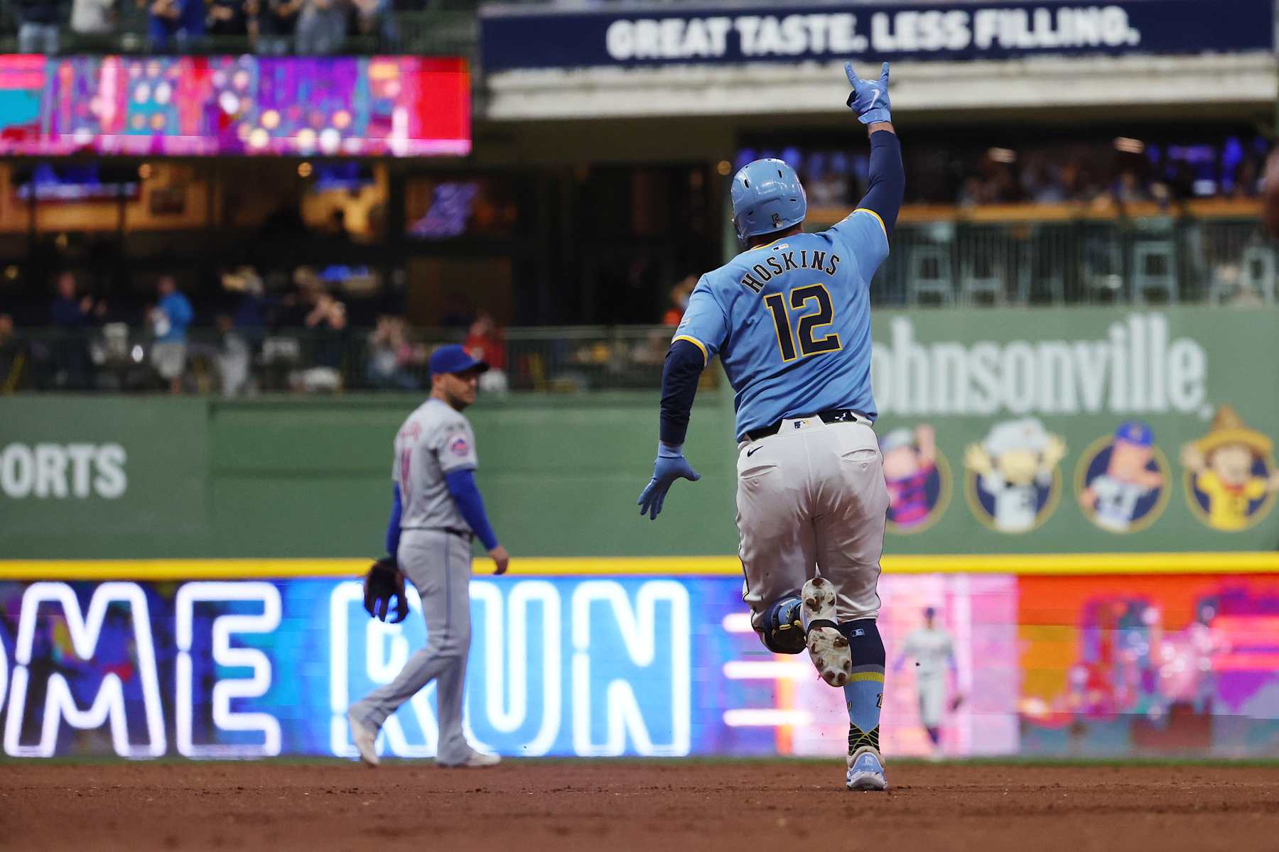 MILWAUKEE, WISCONSIN - SEPTEMBER 27: Rhys Hoskins #12 of the Milwaukee Brewers runs the bases following a grand slam against the New York Mets during the first inning at American Family Field on September 27, 2024 in Milwaukee, Wisconsin. (Photo by Stacy Revere/Getty Images)