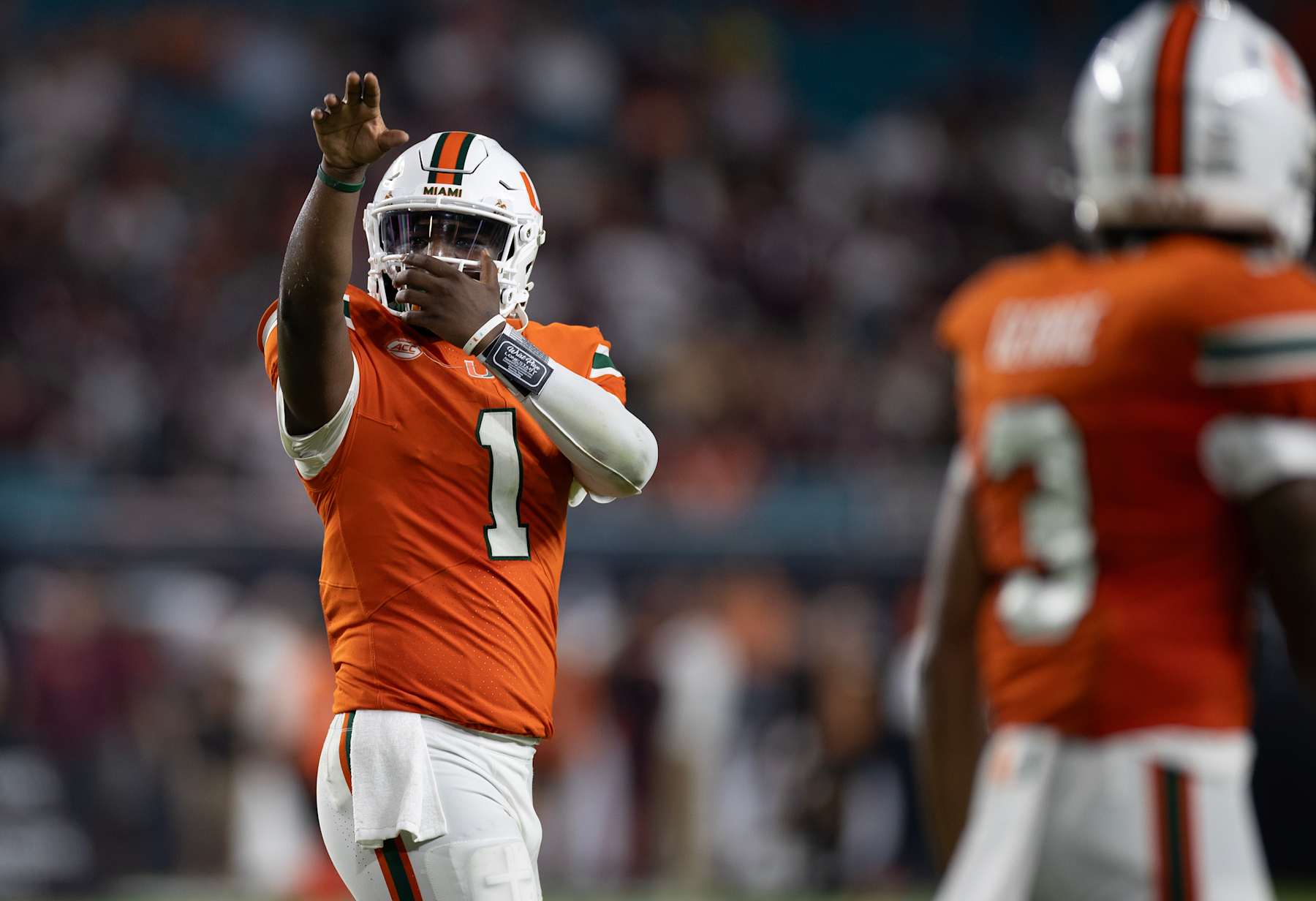 MIAMI GARDENS, FLORIDA - SEPTEMBER 27: Cam Ward #1 of the Miami Hurricanes celebrates with the team after scoring a touchdown during the game against the Virginia Tech Hokies at Hard Rock Stadium on September 27, 2024 in Miami Gardens, Florida. (Photo by Michael Pimentel/ISI Photos/Getty Images)