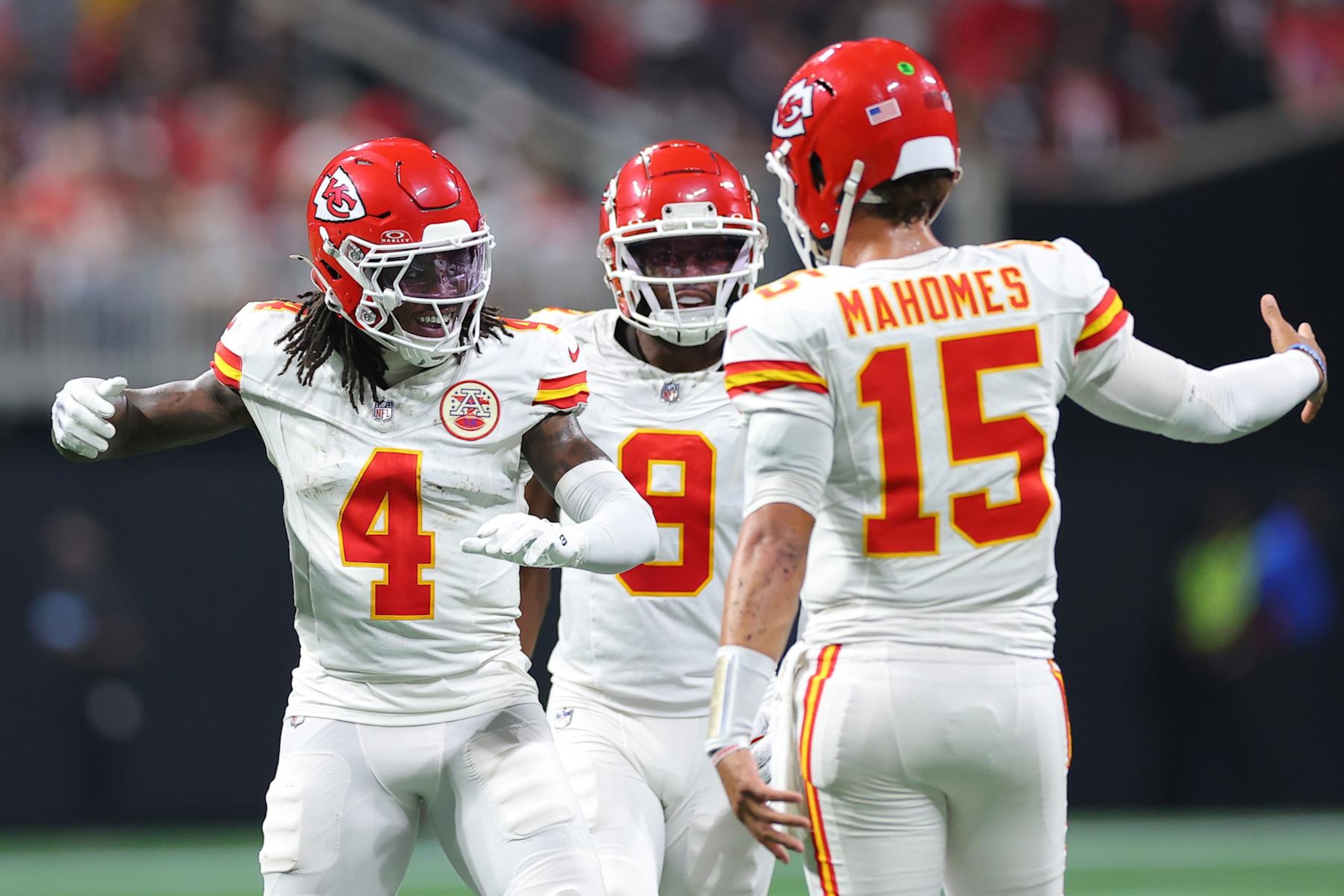 ATLANTA, GEORGIA - SEPTEMBER 22: Rashee Rice #4 of the Kansas City Chiefs celebrates a touchdown with Patrick Mahomes #15 and JuJu Smith-Schuster #9 during the second quarter against the Atlanta Falcons at Mercedes-Benz Stadium on September 22, 2024 in Atlanta, Georgia. (Photo by Kevin C. Cox/Getty Images)
