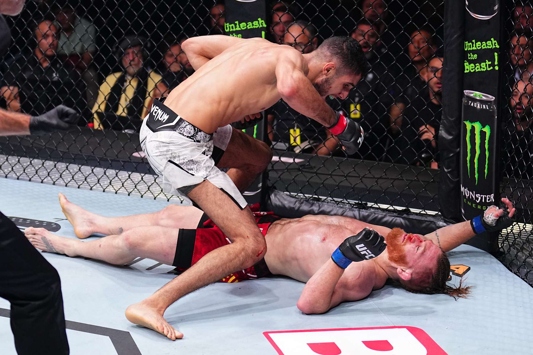 PARIS, FRANCE - SEPTEMBER 28: (L-R) Fares Ziam of France knocks out Matt Frevola in a lightweight fight during the UFC Fight Night event at The Accor Arena on September 28, 2024 in Paris, France. (Photo by Chris Unger/Zuffa LLC)