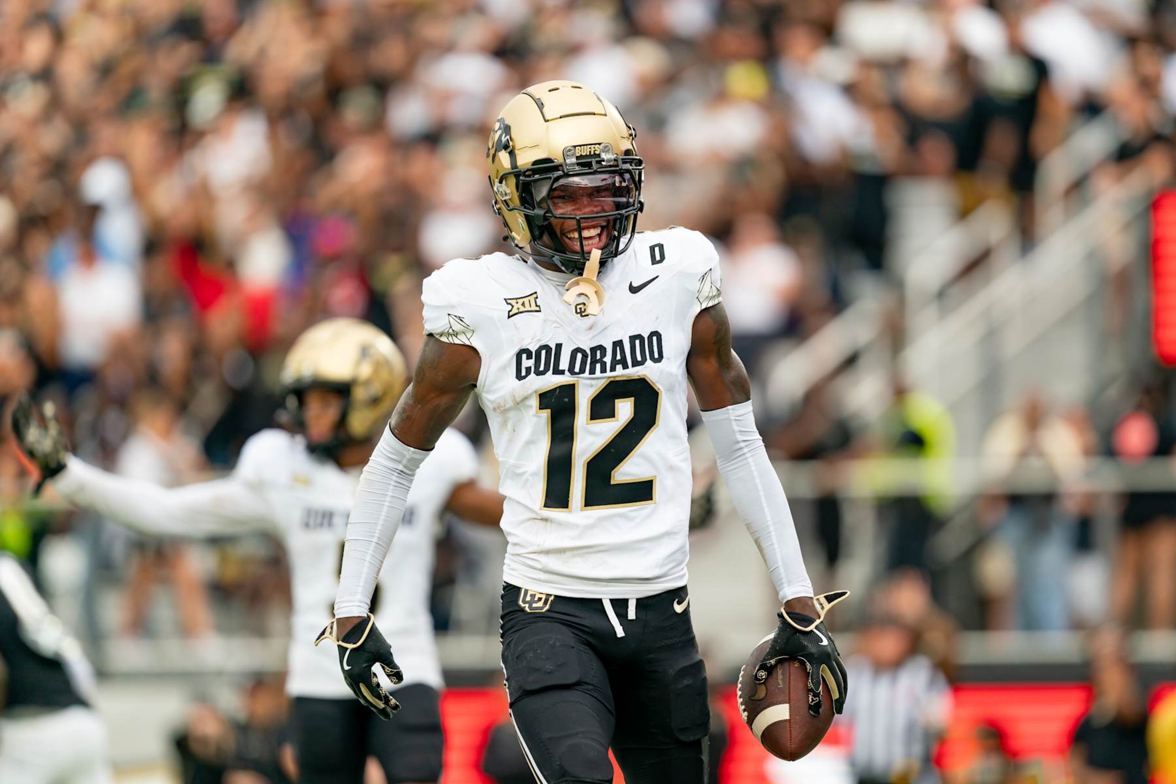 ORLANDO, FL - SEPTEMBER 28:Colorado Buffaloes wide receiver Travis Hunter (12) smiles after a touchdown during a college football game between the Colorado Buffaloes and the UCF Knights on September 28th, 2024 at FBC Mortgage Stadium in Orlando, FL. (Photo by Chris Leduc/Icon Sportswire via Getty Images)