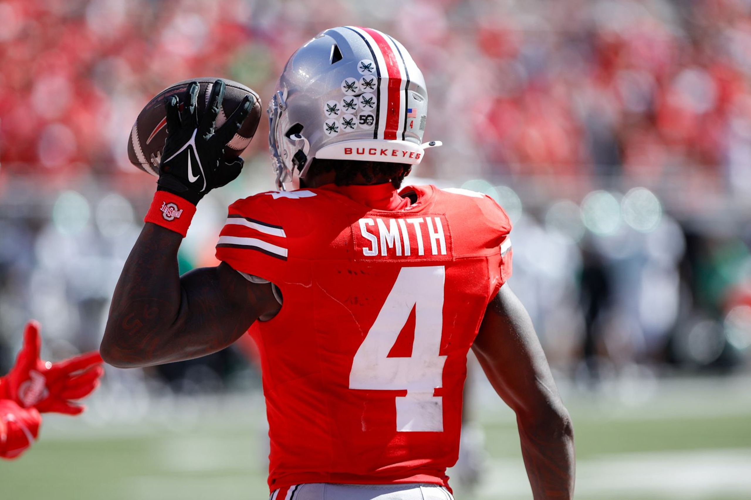 COLUMBUS, OH - SEPTEMBER 21: Ohio State Buckeyes wide receiver Jeremiah Smith (4) stands in the end zone after scoring a touchdown during the game against Marshall Thundering Herd and the Ohio State Buckeyes on September 21, 2024, at Ohio Stadium in Columbus, OH. (Photo by Ian Johnson/Icon Sportswire via Getty Images)