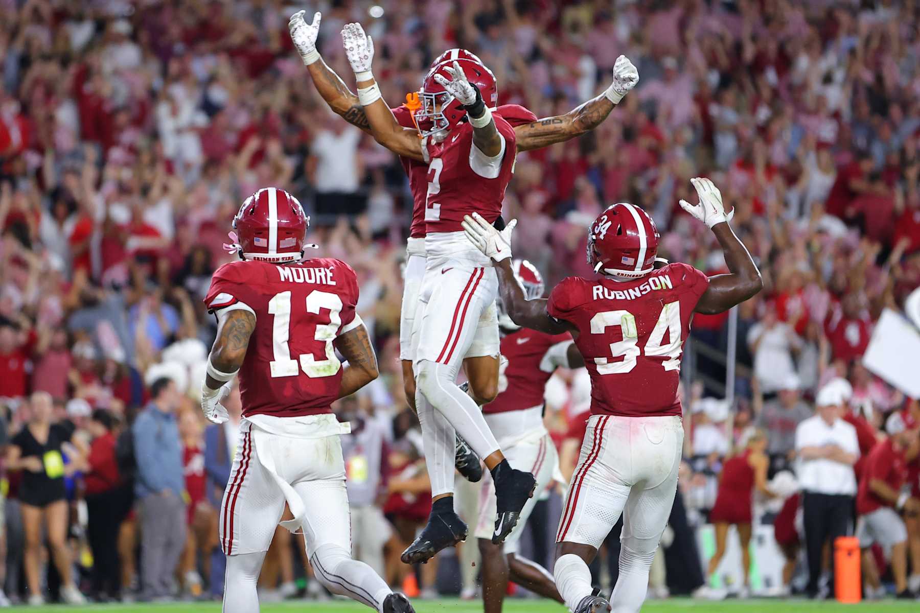 TUSCALOOSA, ALABAMA - SEPTEMBER 28: Zabien Brown #2 of the Alabama Crimson Tide celebrates after his interception against the Georgia Bulldogs with Domani Jackson #1 and teammates during the final minute of the fourth quarter at Bryant-Denny Stadium on September 28, 2024 in Tuscaloosa, Alabama. (Photo by Kevin C. Cox/Getty Images)