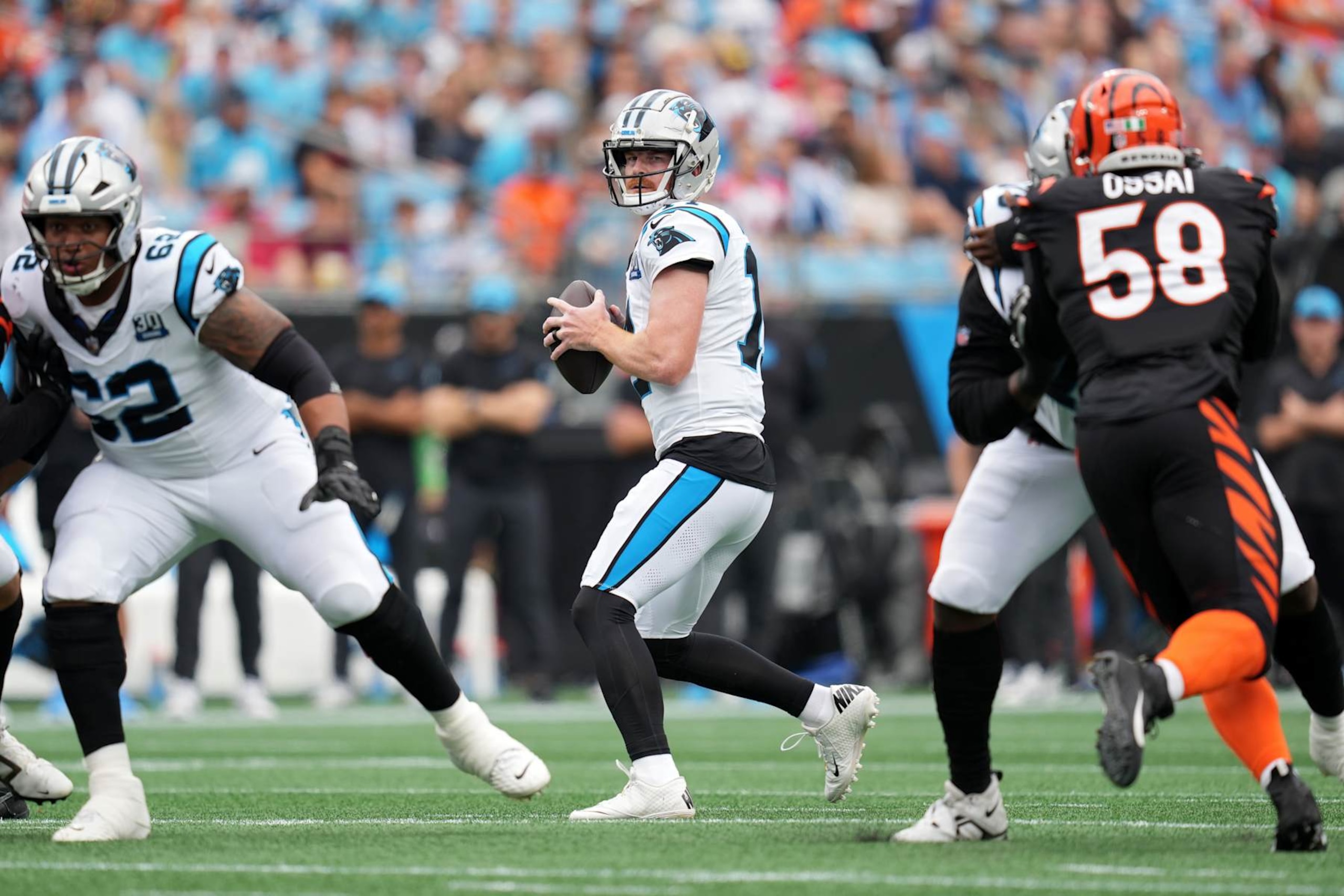 CHARLOTTE, NORTH CAROLINA - SEPTEMBER 29: Andy Dalton #14 of the Carolina Panthers looks to pass during the first quarter against the Cincinnati Bengals at Bank of America Stadium on September 29, 2024 in Charlotte, North Carolina. (Photo by Grant Halverson/Getty Images) CHARLOTTE, NORTH CAROLINA - SEPTEMBER 29: Andy Dalton #14 of the Carolina Panthers looks to pass during the first quarter against the Cincinnati Bengals at Bank of America Stadium on September 29, 2024 in Charlotte, North Carolina. (Photo by Grant Halverson/Getty Images)