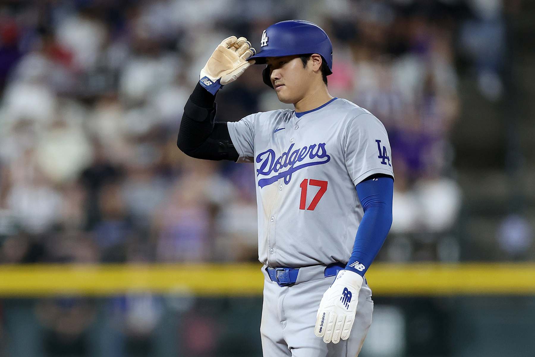 DENVER, COLORADO - SEPTEMBER 28: Shohei Ohtani #17 of the Los Angeles Dodgers gestures to his dugout after stealing second base against the Colorado Rockies in the fifth inning at Coors Field on September 28, 2024 in Denver, Colorado. (Photo by Matthew Stockman/Getty Images)