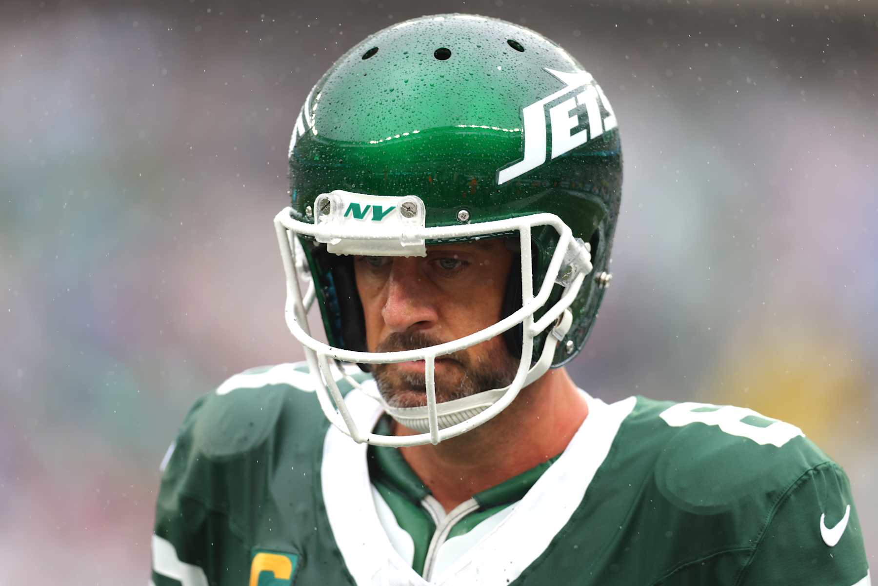 EAST RUTHERFORD, NEW JERSEY - SEPTEMBER 29: Aaron Rodgers (8) of the New York Jets looks on against the Denver Broncos during the first half at MetLife Stadium on September 29, 2024 in East Rutherford, New Jersey. (Photo by Mike Stobe/Getty Images)