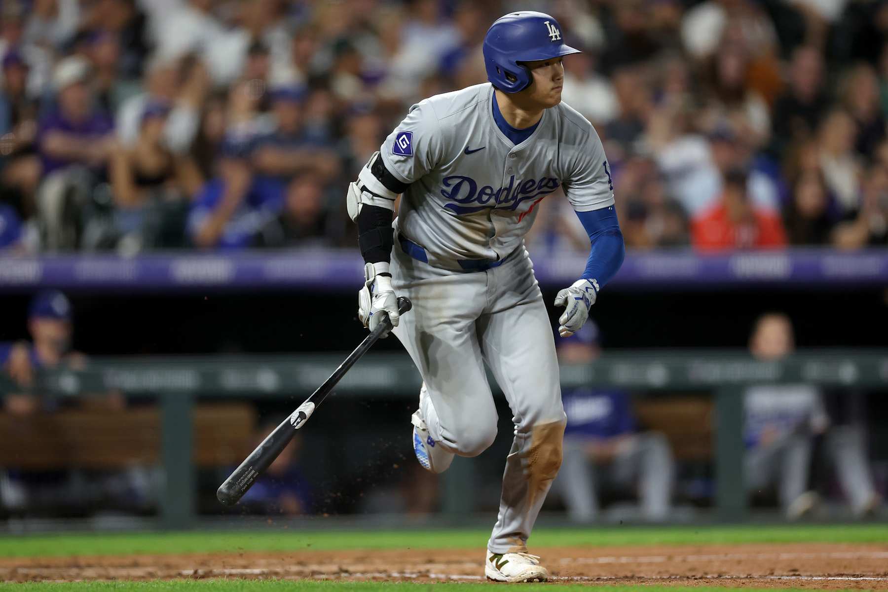 DENVER, COLORADO - SEPTEMBER 28: Shohei Ohtani #17 of the Los Angeles Dodgers hits a single against the Colorado Rockies in the sixth inning at Coors Field on September 28, 2024 in Denver, Colorado. (Photo by Matthew Stockman/Getty Images)