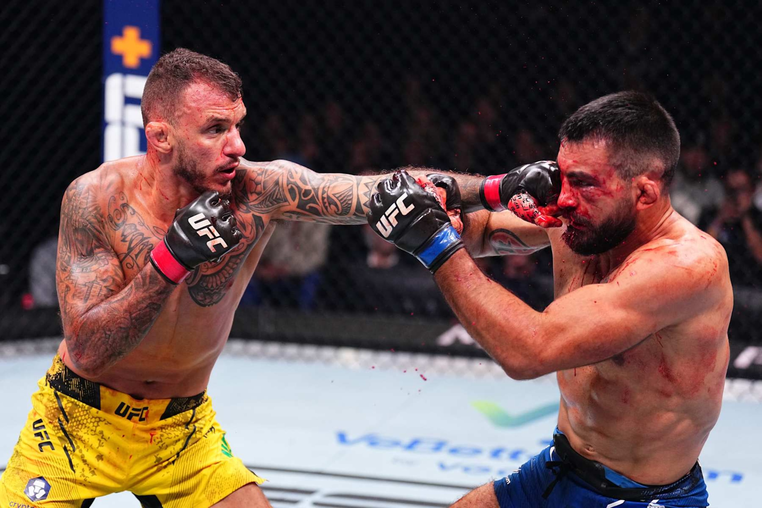 Renato Moicano punches Benoit Saint Denis