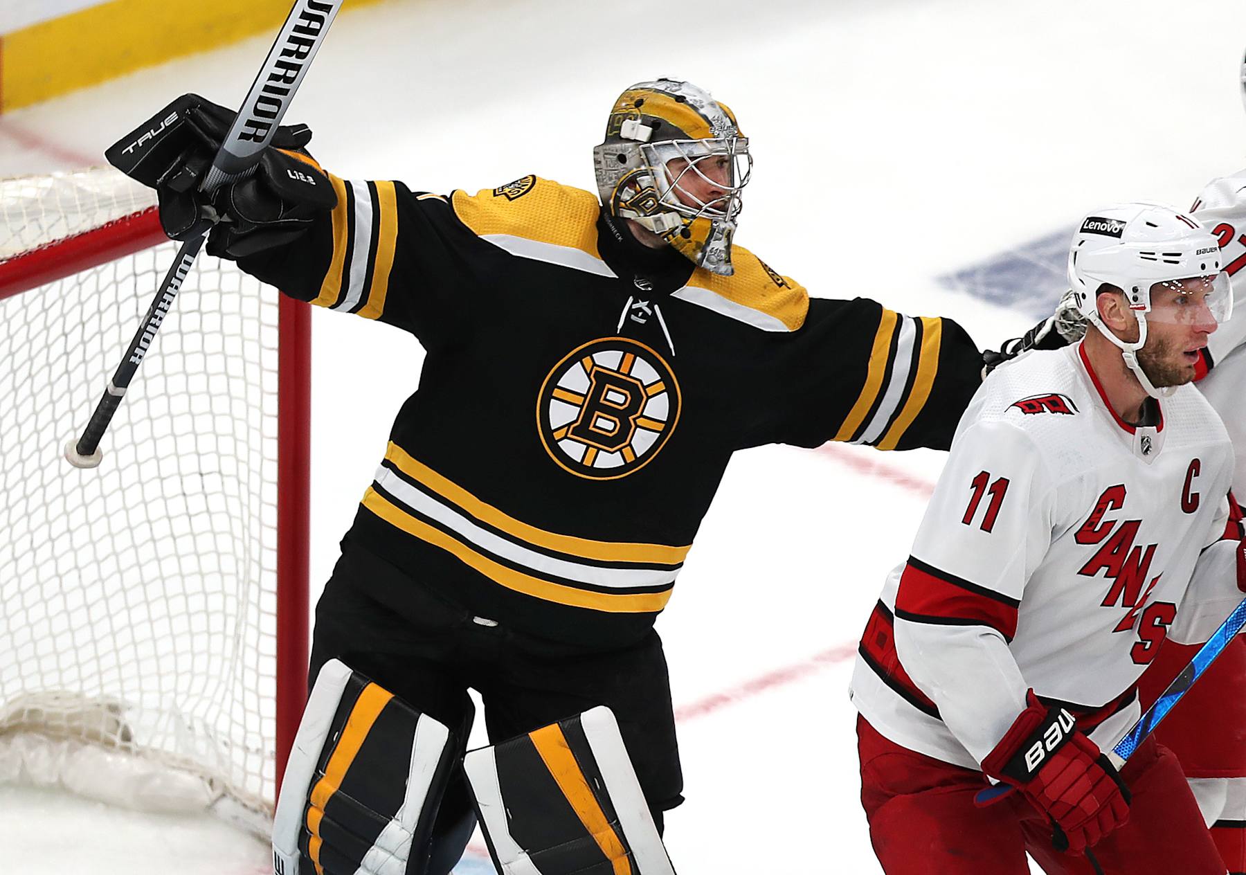 Boston - May 8: Boston Bruins goaltender Jeremy Swayman (1) clears out his crease late in the 3rd period. The Boston Bruins host the Carolina Hurricanes in an NHL game at TD Garden in Boston on May 8, 2022. (Photo by John Tlumacki/The Boston Globe via Getty Images)