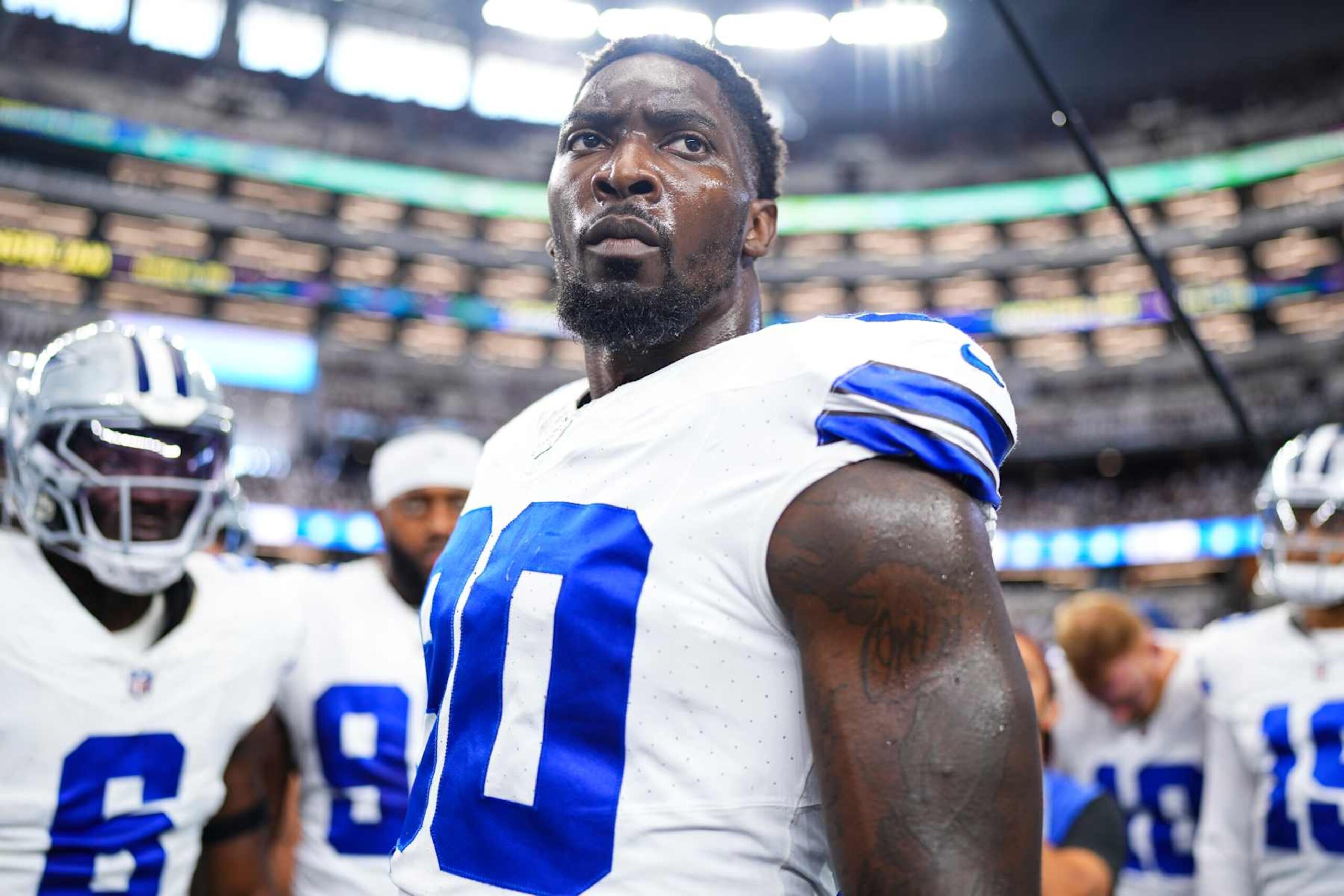 ARLINGTON, TX - SEPTEMBER 22: DeMarcus Lawrence #90 of the Dallas Cowboys leads a huddle prior to an NFL football game against the Baltimore Ravens at AT&T Stadium on September 22, 2024 in Arlington, Texas. (Photo by Cooper Neill/Getty Images)