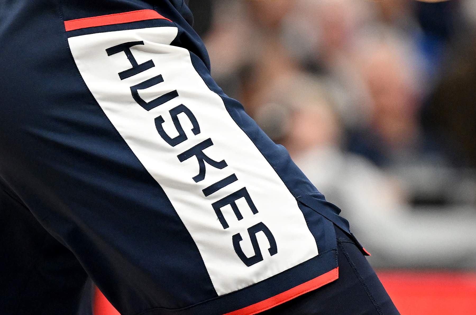 WASHINGTON, DC - FEBRUARY 10: A view of the Connecticut Huskies logo on their uniform during the game against the Georgetown Hoyas at Capital One Arena on February 10, 2024 in Washington, DC. (Photo by G Fiume/Getty Images)