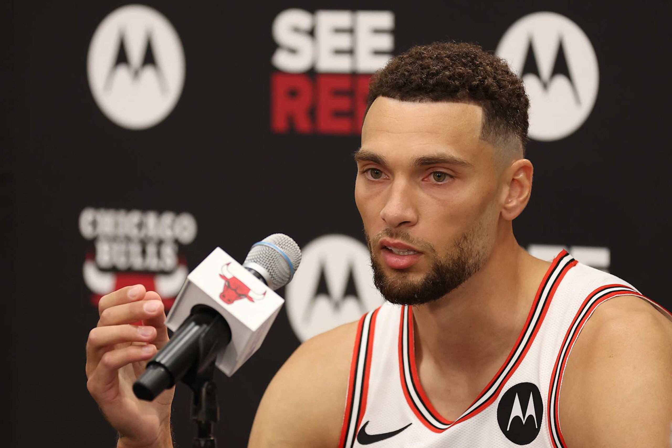 CHICAGO, ILLINOIS - SEPTEMBER 30: Zach LaVine #8 of the Chicago Bulls speaks to the media during Chicago Bulls Media Day at Advocate Center on September 30, 2024 in Chicago, Illinois.  (Photo by Michael Reaves/Getty Images)
