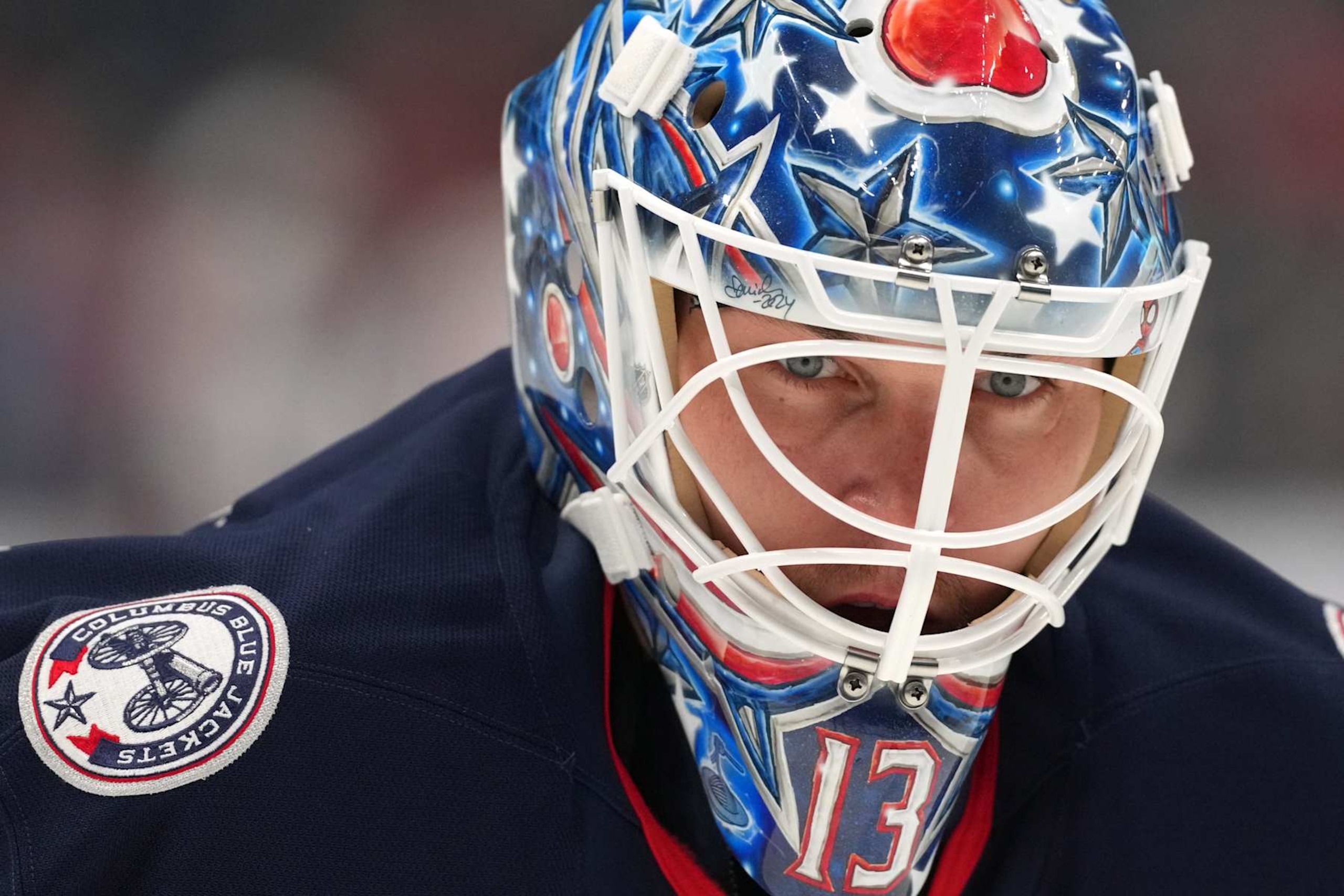 COLUMBUS, OHIO - SEPTEMBER 30: Elvis Merzlikins #90 of the Columbus Blue Jackets looks on before a preseason game against the Washington Capitals at Nationwide Arena on September 30, 2024 in Columbus, Ohio.  (Photo by Jason Mowry/Getty Images)
