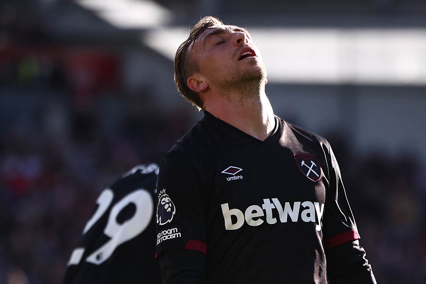 West Ham United's English striker #20 Jarrod Bowen reacts after failing to score during the English Premier League football match between Brentford and West Ham United at the Gtech Community Stadium in London on September 28, 2024. (Photo by HENRY NICHOLLS / AFP) / RESTRICTED TO EDITORIAL USE. No use with unauthorized audio, video, data, fixture lists, club/league logos or 'live' services. Online in-match use limited to 120 images. An additional 40 images may be used in extra time. No video emulation. Social media in-match use limited to 120 images. An additional 40 images may be used in extra time. No use in betting publications, games or single club/league/player publications. / (Photo by HENRY NICHOLLS/AFP via Getty Images)