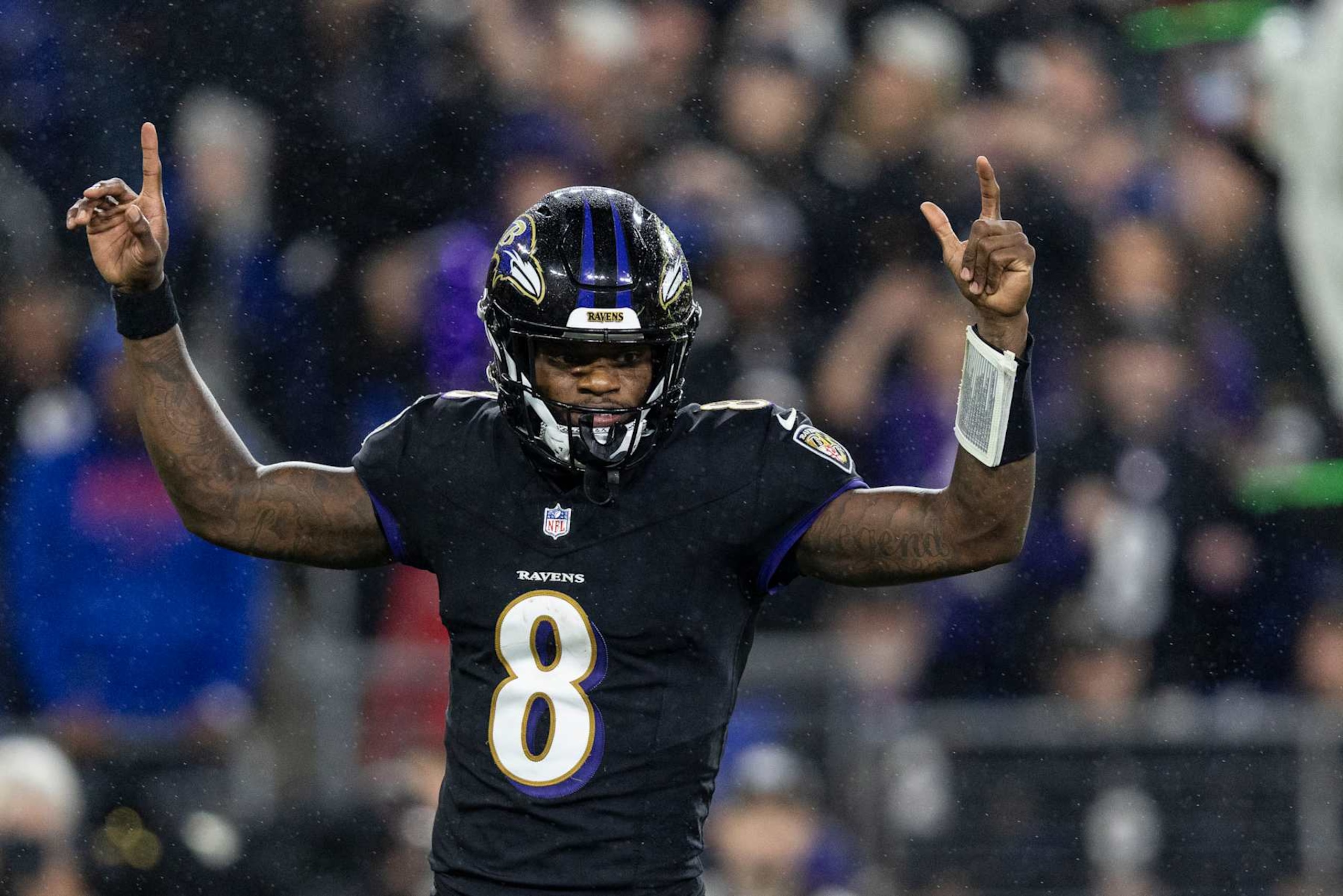 BALTIMORE, MARYLAND - SEPTEMBER 29: Lamar Jackson #8 of the Baltimore Ravens celebrates after a touchdown during an NFL football game against the Buffalo Bills at M&T Bank Stadium on September 29, 2024 in Baltimore, Maryland. (Photo by Michael Owens/Getty Images)