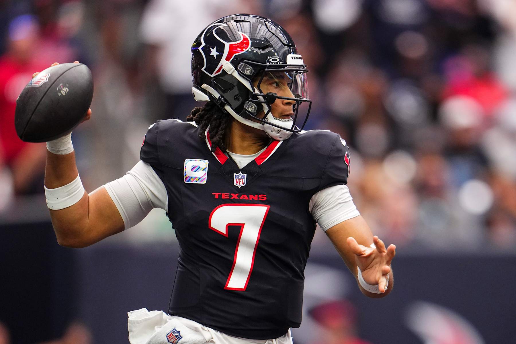 HOUSTON, TX - SEPTEMBER 29: C.J. Stroud #7 of the Houston Texans throws the ball during an NFL football game against the Jacksonville Jaguars at NRG Stadium on September 29, 2024 in Houston, Texas. (Photo by Cooper Neill/Getty Images)