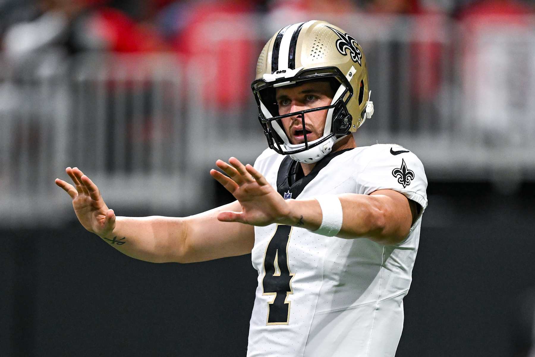 ATLANTA, GA  SEPTEMBER 29:  New Orleans quarterback Derek Carr (4) reacts during the NFL game between the New Orleans Saints and the Atlanta Falcons on September 29th, 2024 at Mercedes-Benz Stadium in Atlanta, GA.  (Photo by Rich von Biberstein/Icon Sportswire via Getty Images)