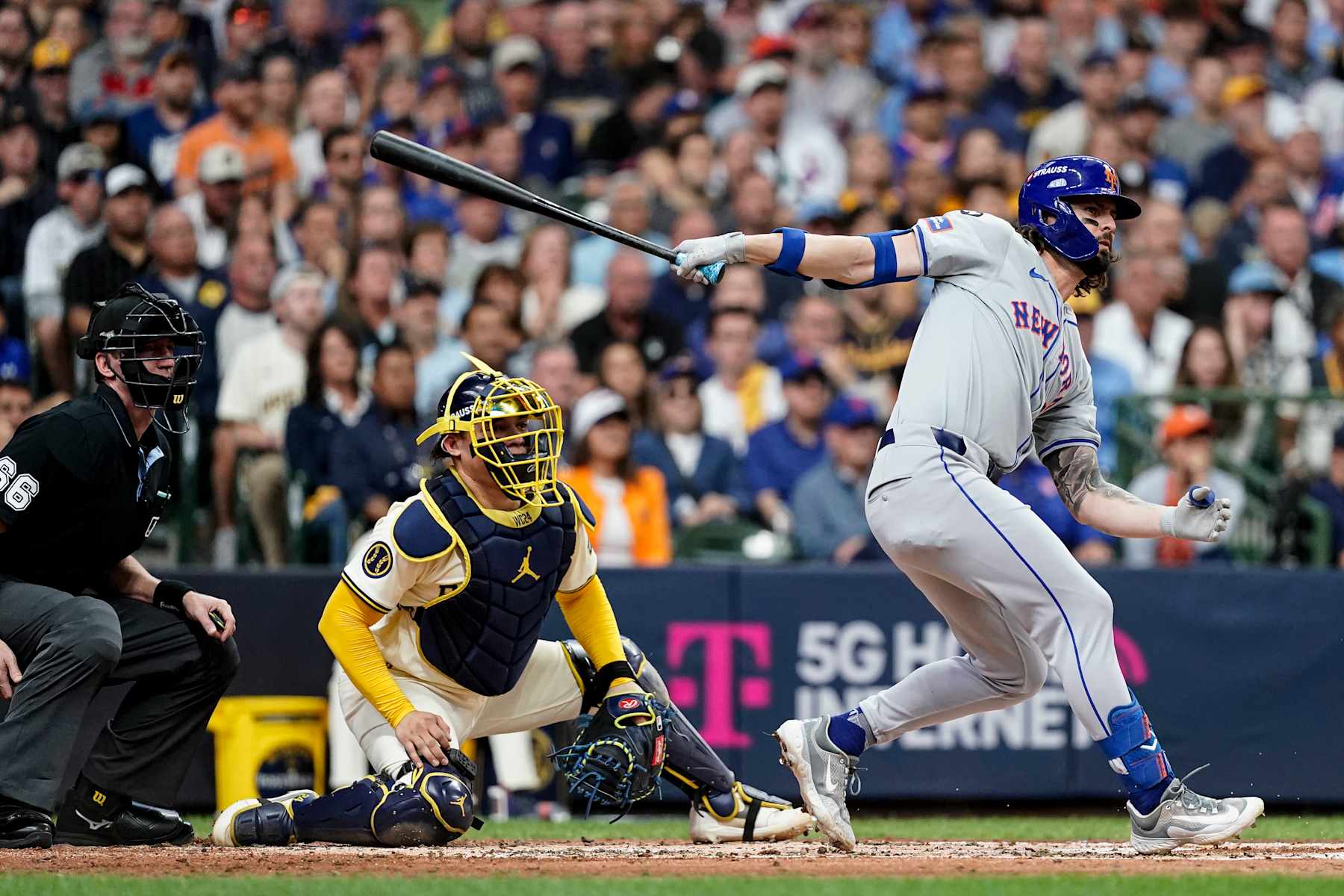 MILWAUKEE, WI - OCTOBER 01: Jesse Winker #3 of the New York Mets hits a RBI triple in the second inning of Game 1 of the Wild Card Series presented by T-Mobile 5G Home Internet between the New York Mets and the Milwaukee Brewers at American Family Field on Tuesday, October 1, 2024 in Milwaukee, Wisconsin. (Photo by Aaron Gash/MLB Photos via Getty Images)
