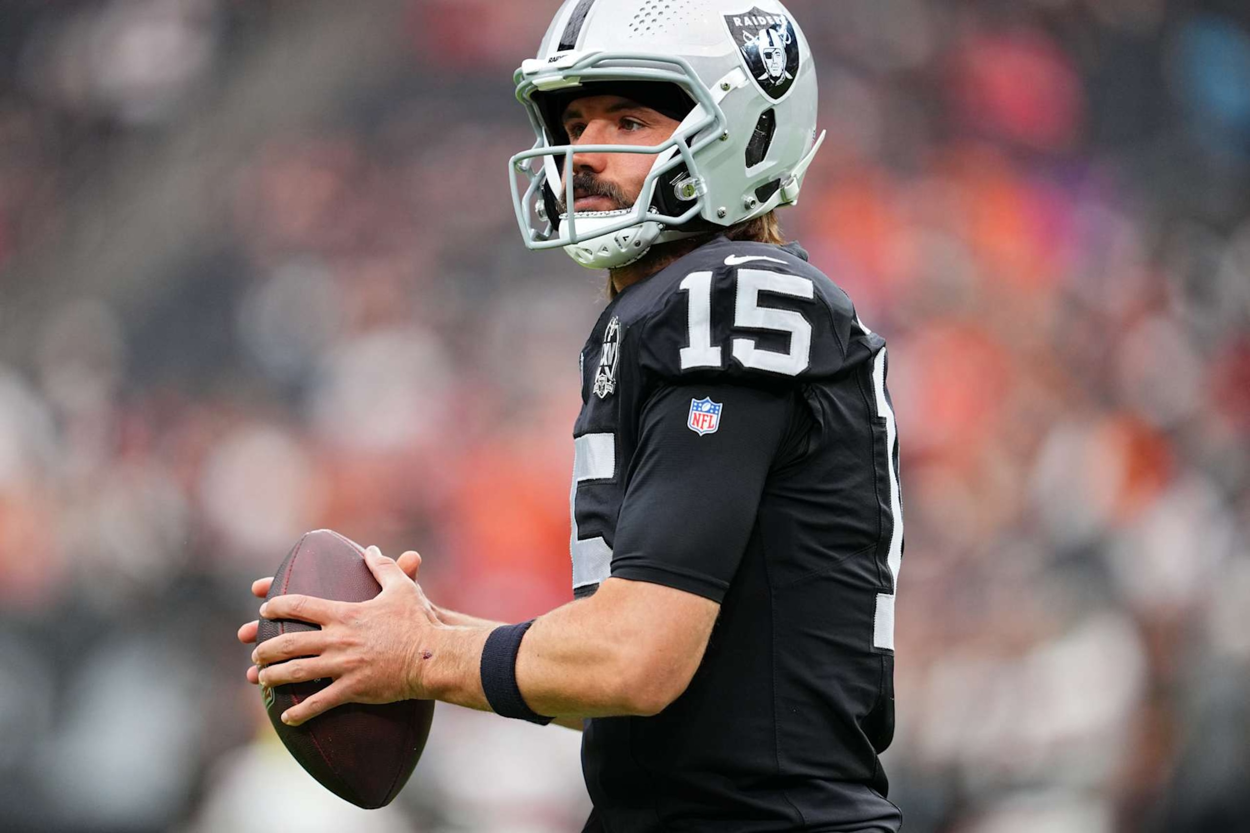 LAS VEGAS, NEVADA - SEPTEMBER 29: Gardner Minshew #15 of the Las Vegas Raiders warms up before the game against the Cleveland Browns at Allegiant Stadium on September 29, 2024 in Las Vegas, Nevada. (Photo by Jeff Bottari/Getty Images)