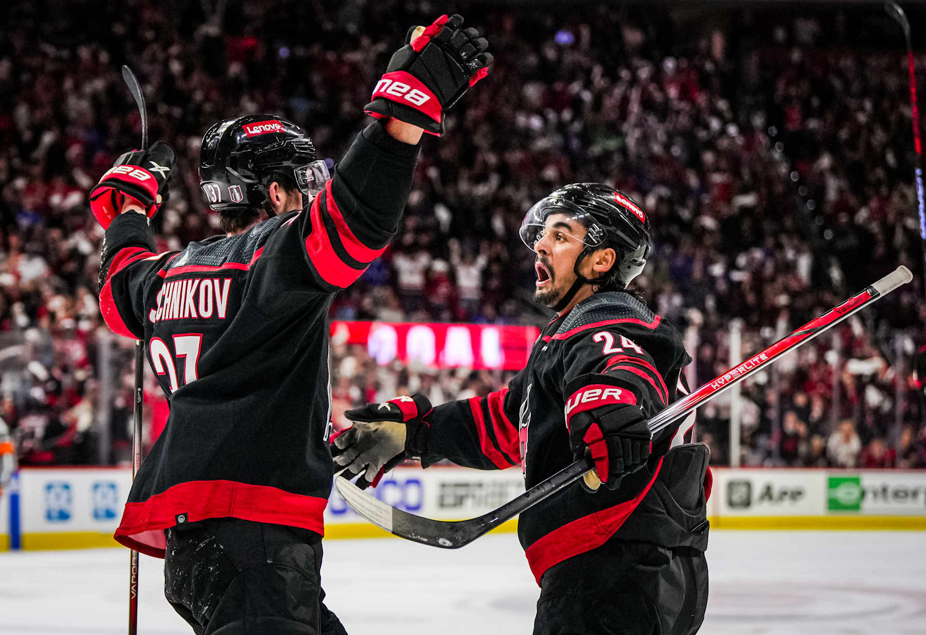 RALEIGH, NORTH CAROLINA - MAY 09: Andrei Svechnikov #37 of the Carolina Hurricanes celebrates his goal against the New York Rangers with teammate Seth Jarvis #24 during the third period in Game Three of the Second Round of the 2024 Stanley Cup Playoffs at PNC Arena on May 09, 2024 in Raleigh, North Carolina.  (Photo by Josh Lavallee/NHLI via Getty Images)