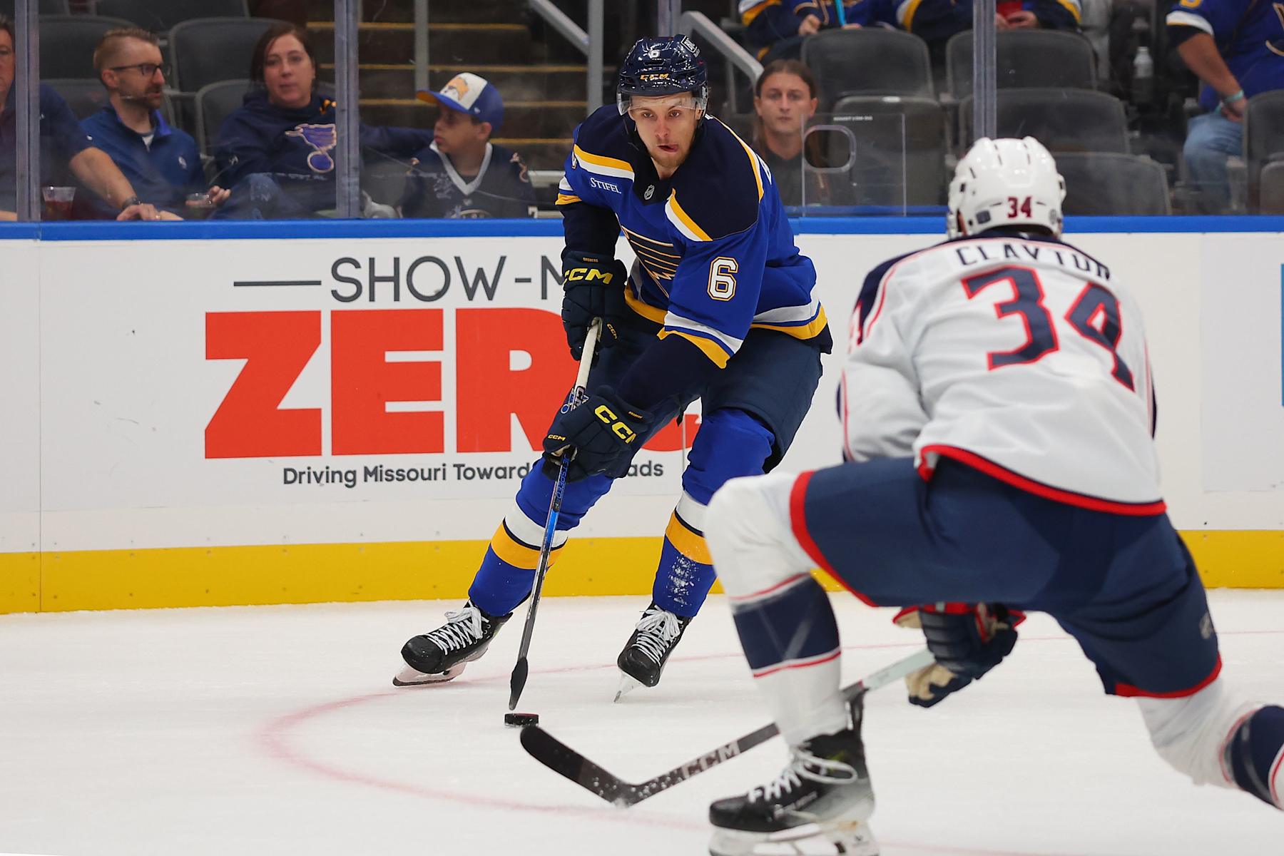 ST LOUIS, MISSOURI - OCTOBER 1: Philip Broberg #6 of the St. Louis Blues looks to shoot the puck against the Columbus Blue Jackets in the first period of a preseason game at Enterprise Center on October 1, 2024 in St Louis, Missouri. (Photo by Dilip Vishwanat/Getty Images)