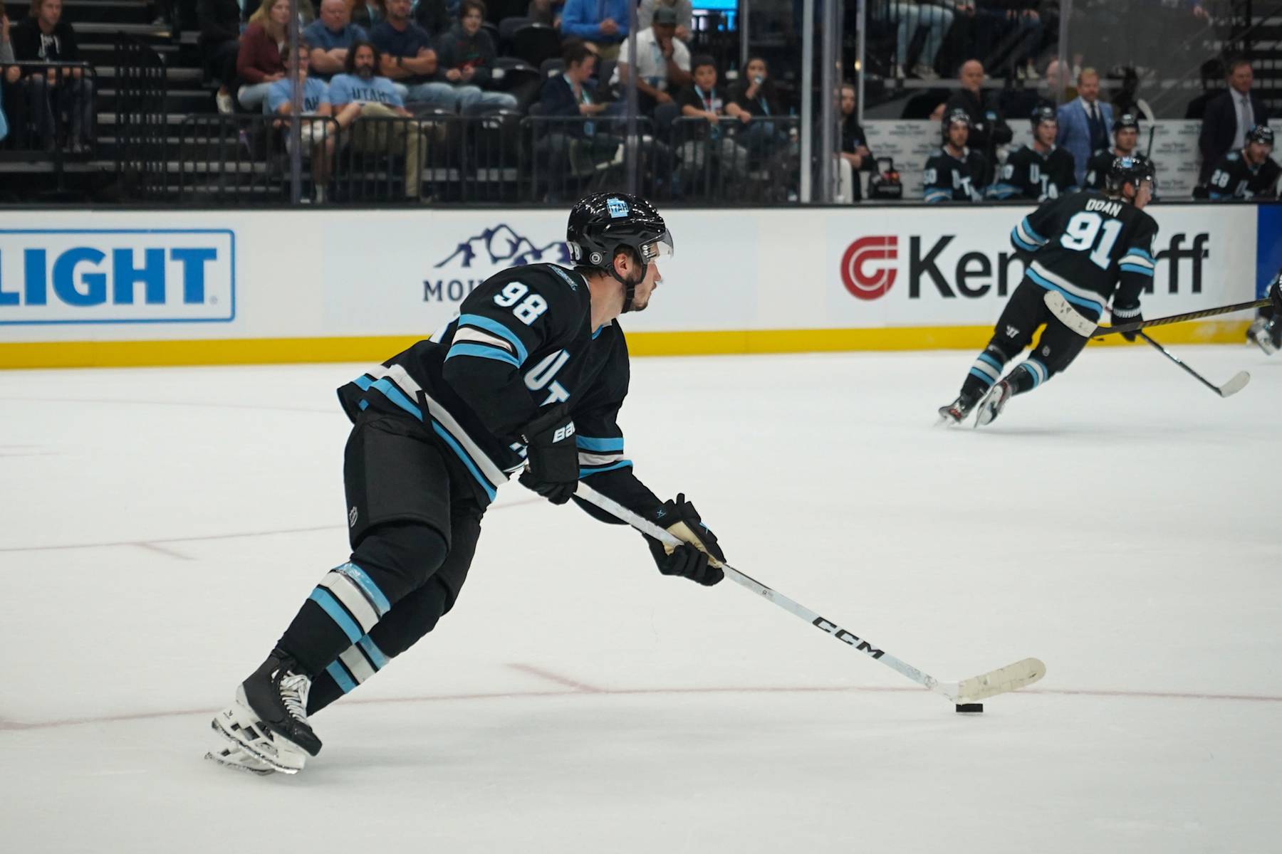 SALT LAKE CITY, UT - SEPTEMBER 23: Defenseman Mikhail Sergachev (98) of Utah Hockey Club skates the puck up the ice during an NHL preseason game between the Los Angeles Kings and the Utah Hockey Club on September 23, 2024, at the Delta Center in Salt Lake City, UT. (Photo by Aaron Baker/Icon Sportswire via Getty Images)